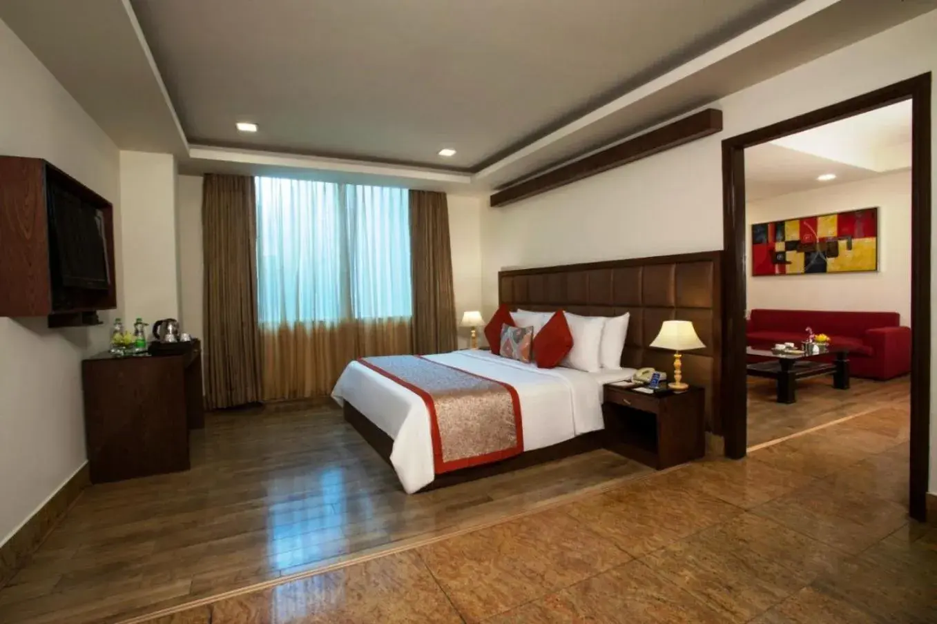 Photo of the whole room, Bed in Taurus Sarovar Portico