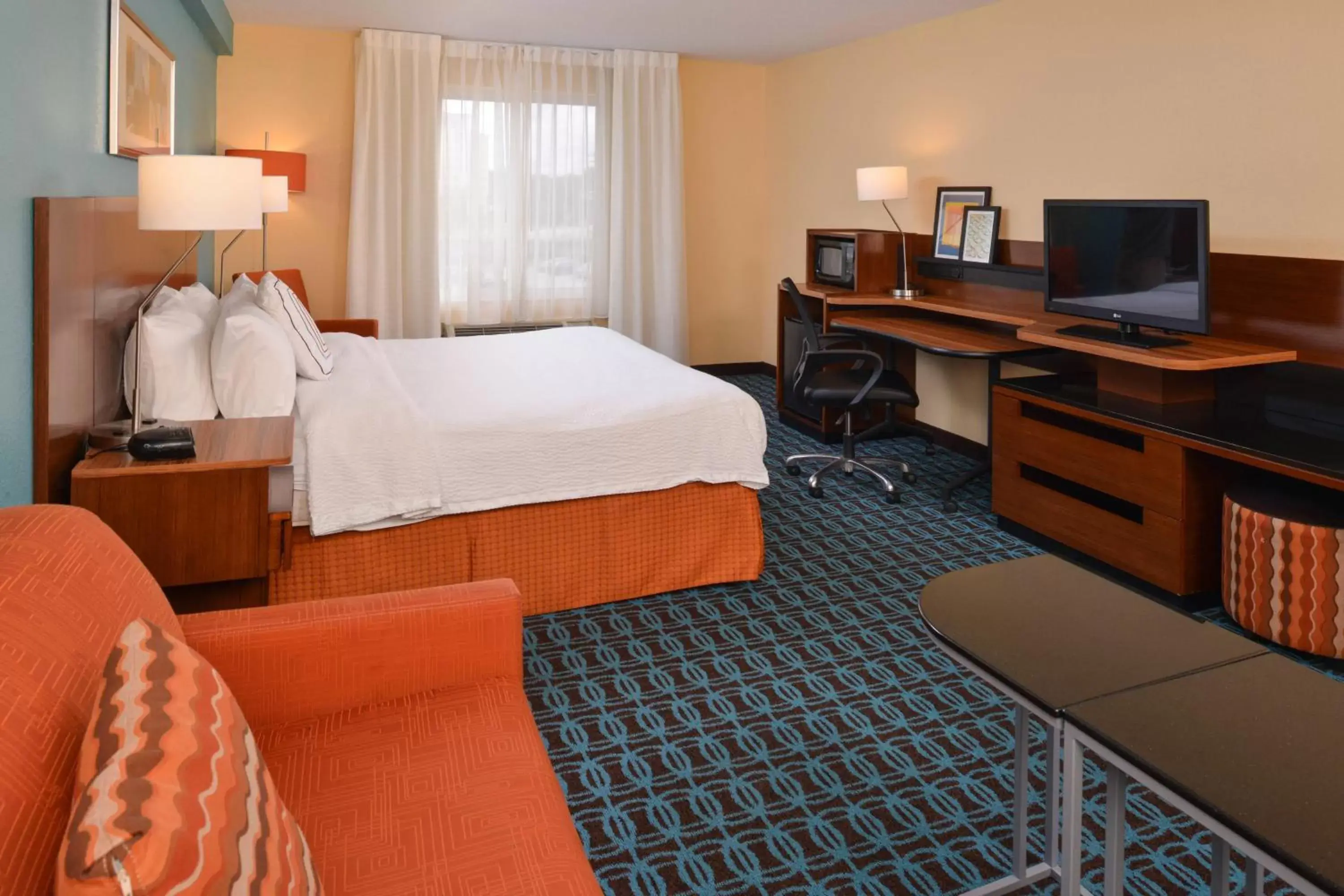 Photo of the whole room, TV/Entertainment Center in Fairfield Inn St. Louis St. Charles