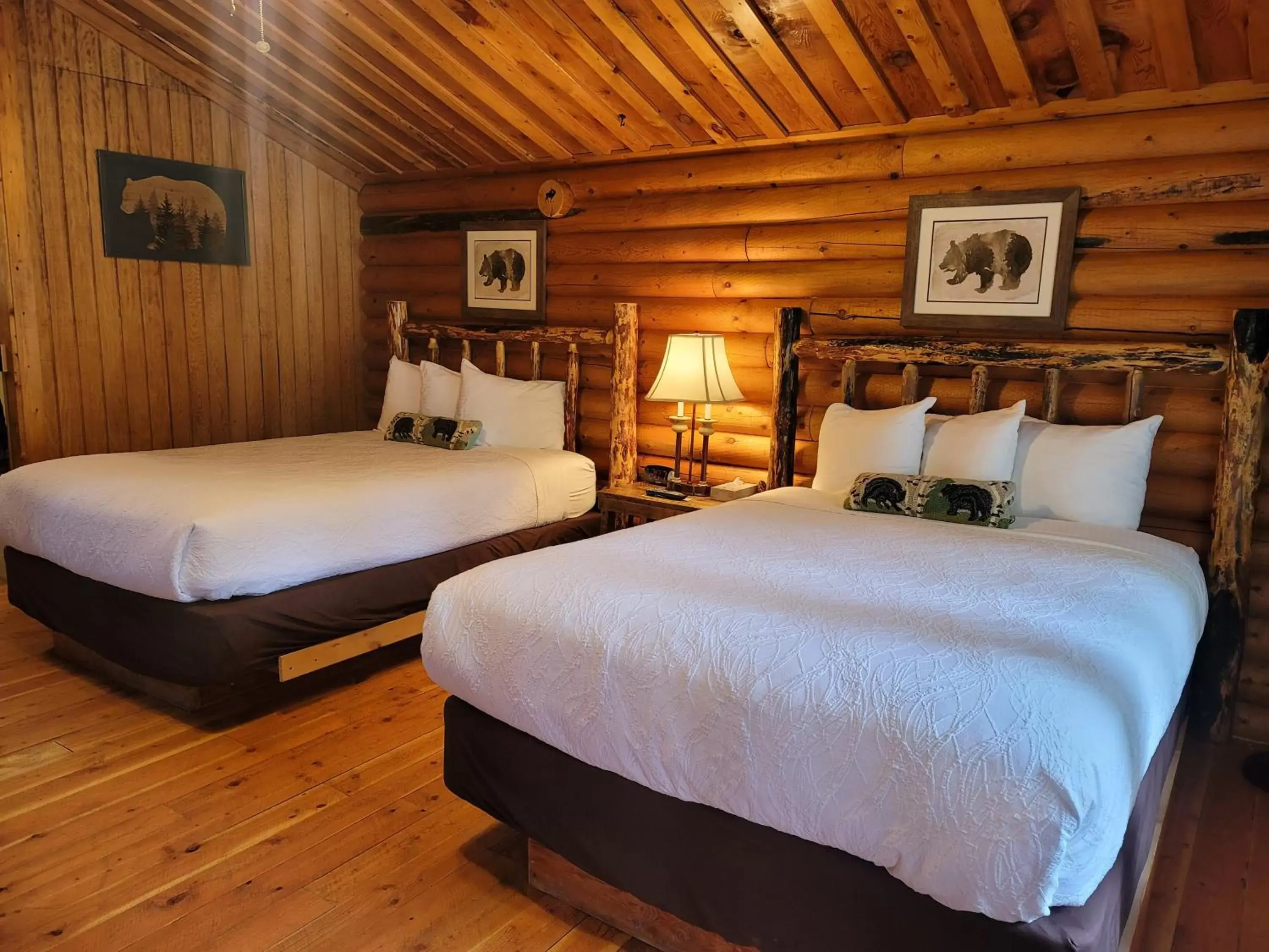 Bed in Riverfront Motel & Cabins