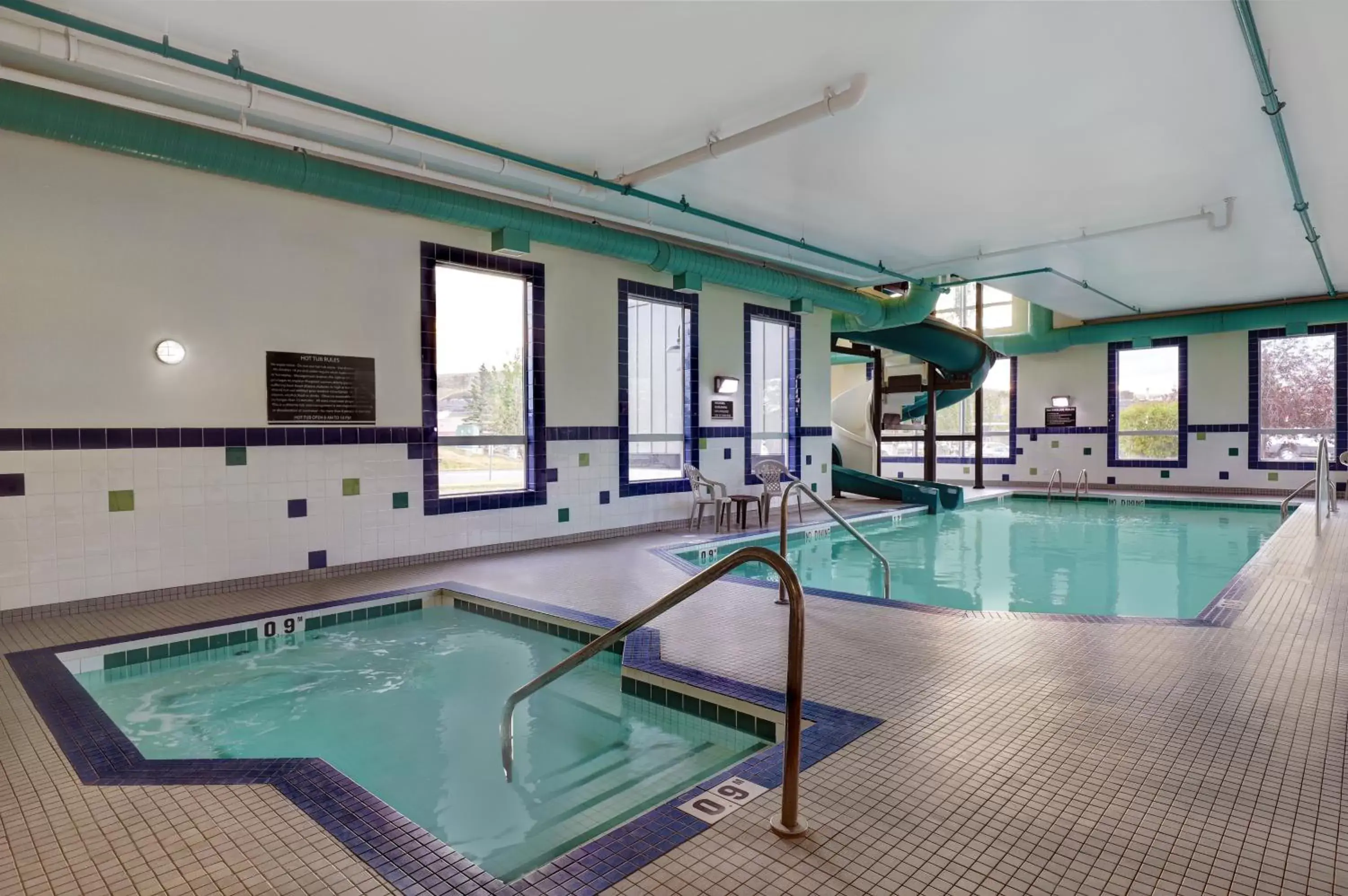 Hot Tub, Swimming Pool in SureStay Plus Hotel by Best Western Drumheller