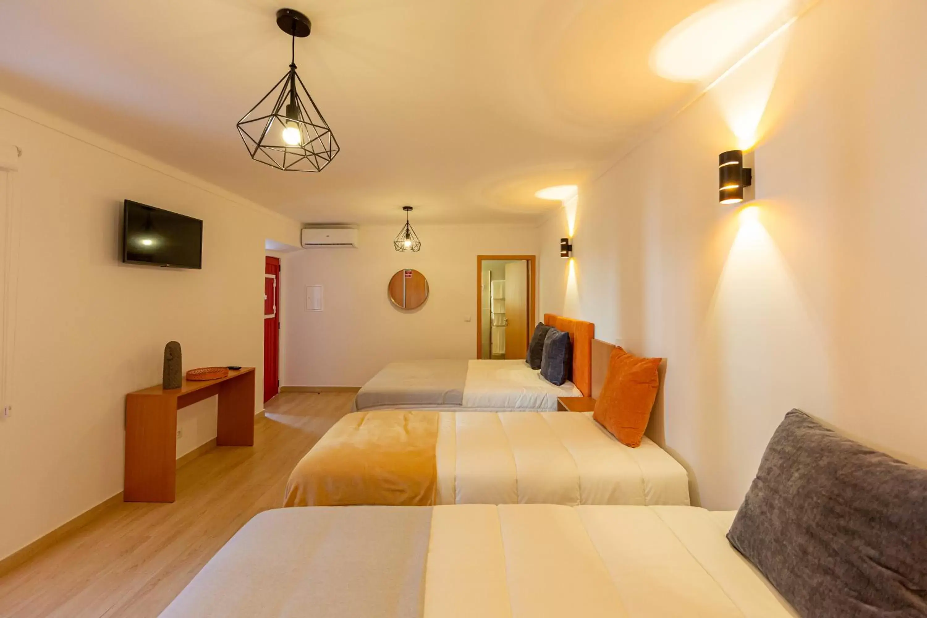 Bed, Seating Area in Luxury Palm Suites