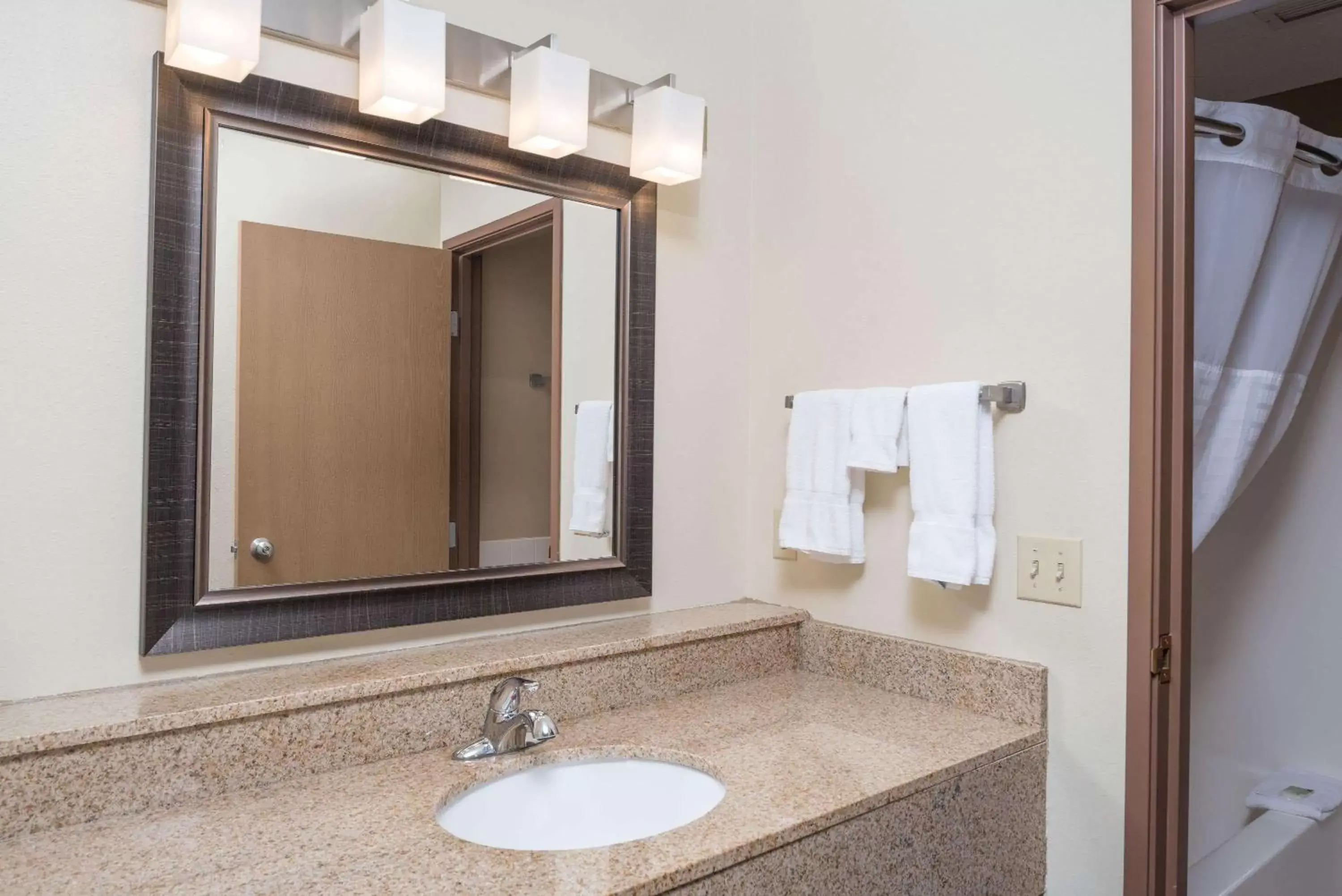 Bathroom in AmericInn by Wyndham Valley City Conference Center