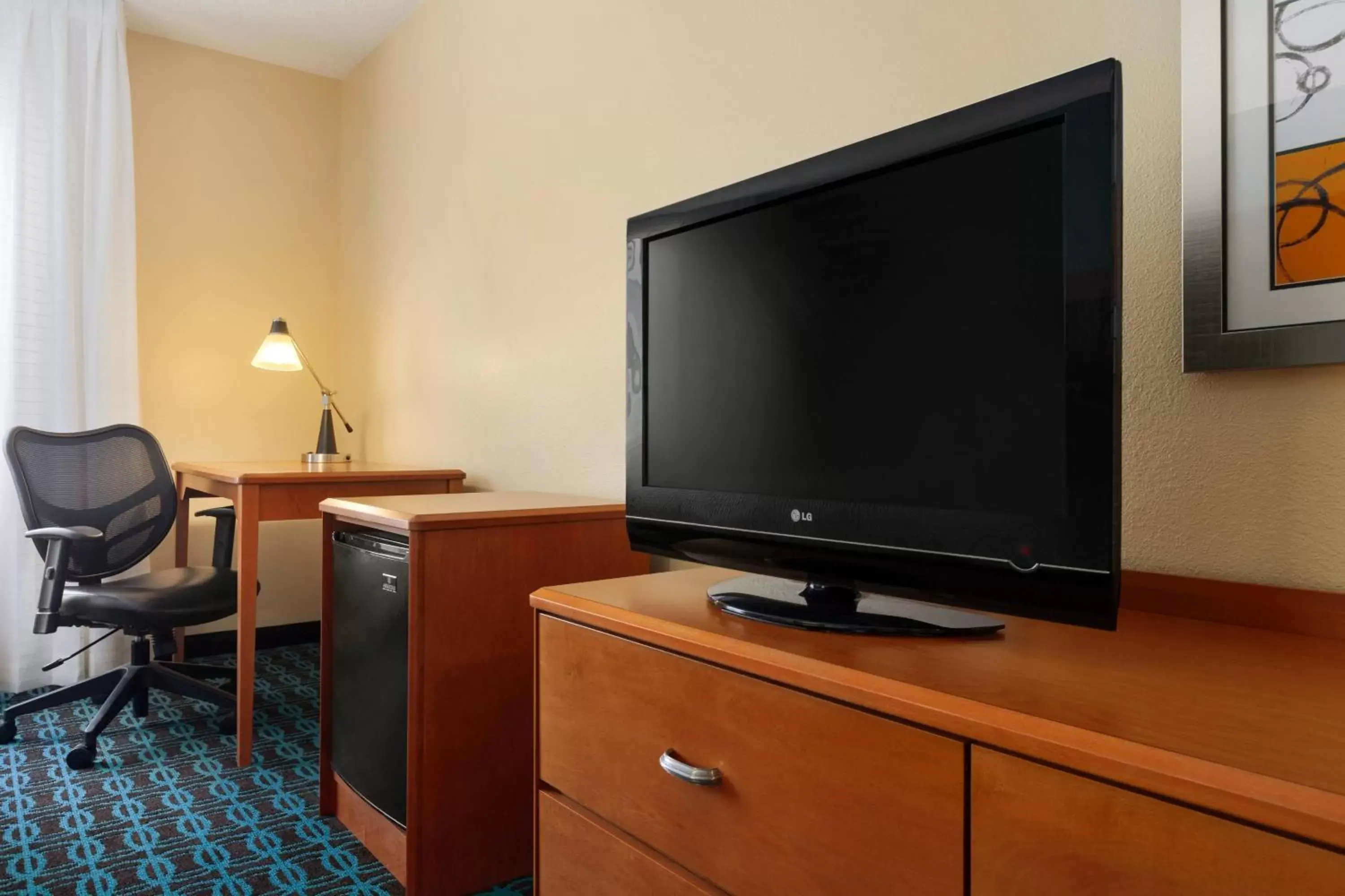 Photo of the whole room, TV/Entertainment Center in Fairfield Inn & Suites Omaha East/Council Bluffs, IA