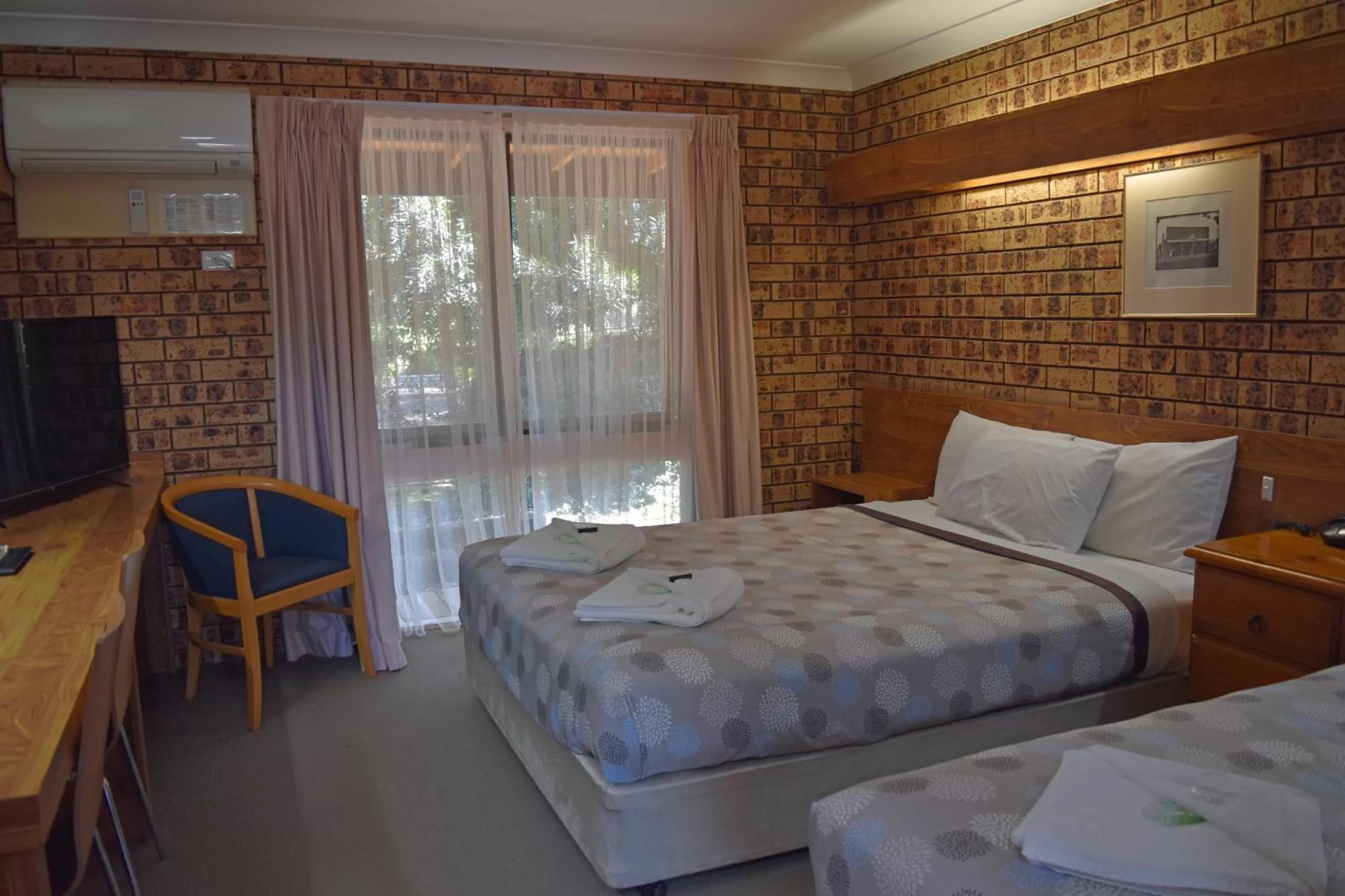 Bed in Ten Dollar Town Motel