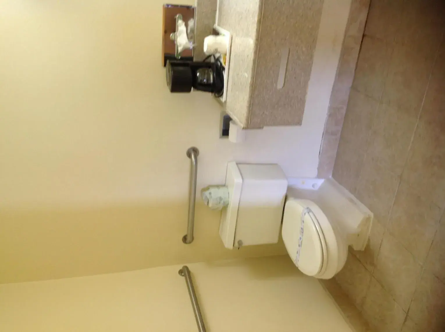 Toilet, Bathroom in Days Inn by Wyndham Clinton