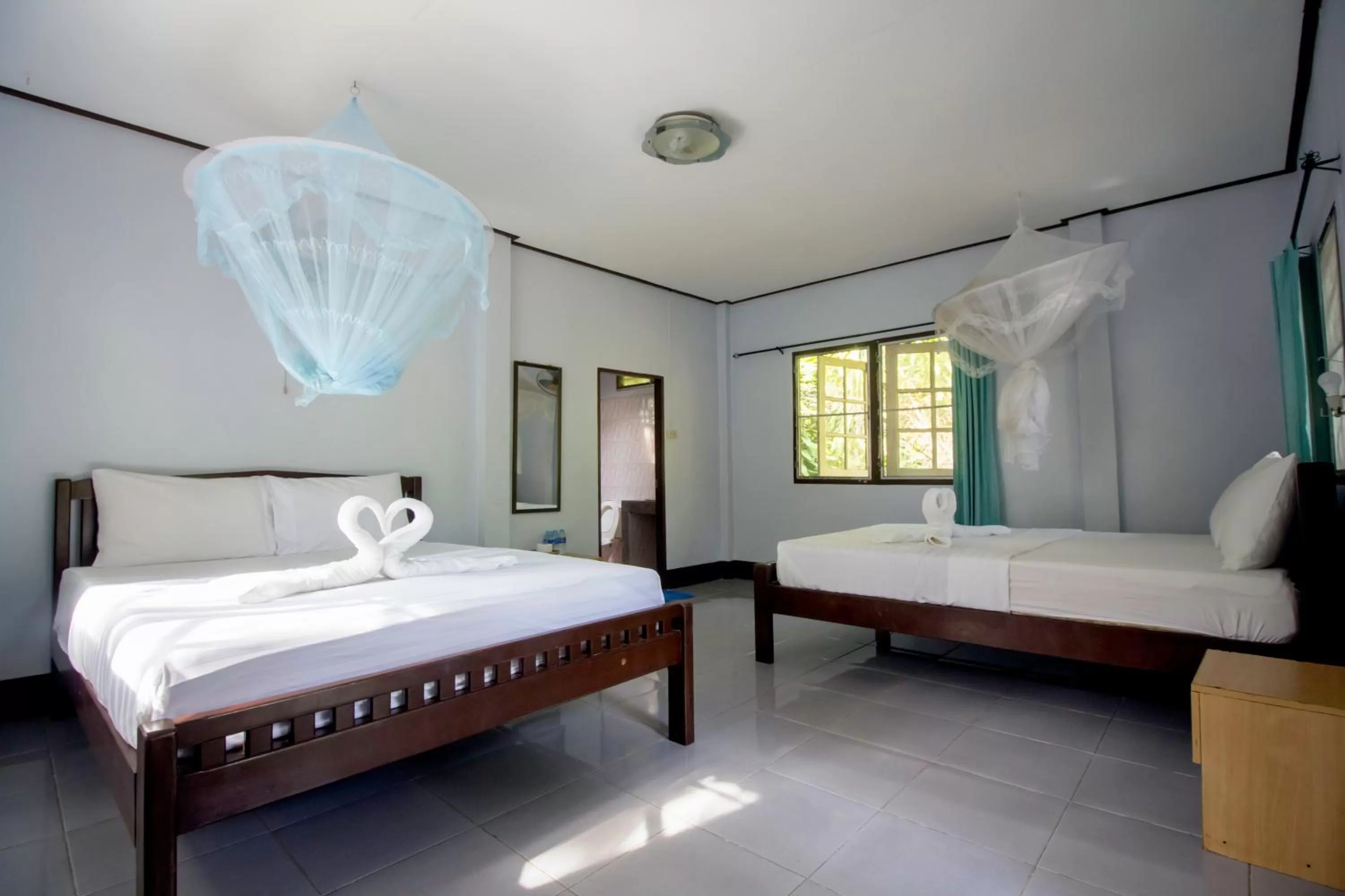 Bed in Khao Sok Palmview Resort