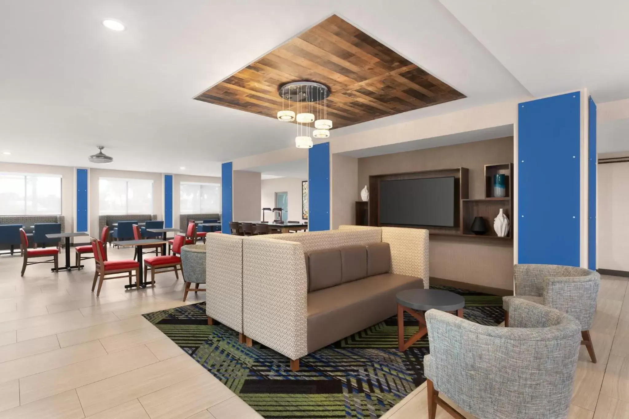 Property building, Seating Area in Holiday Inn Express Vero Beach-West I-95, an IHG Hotel