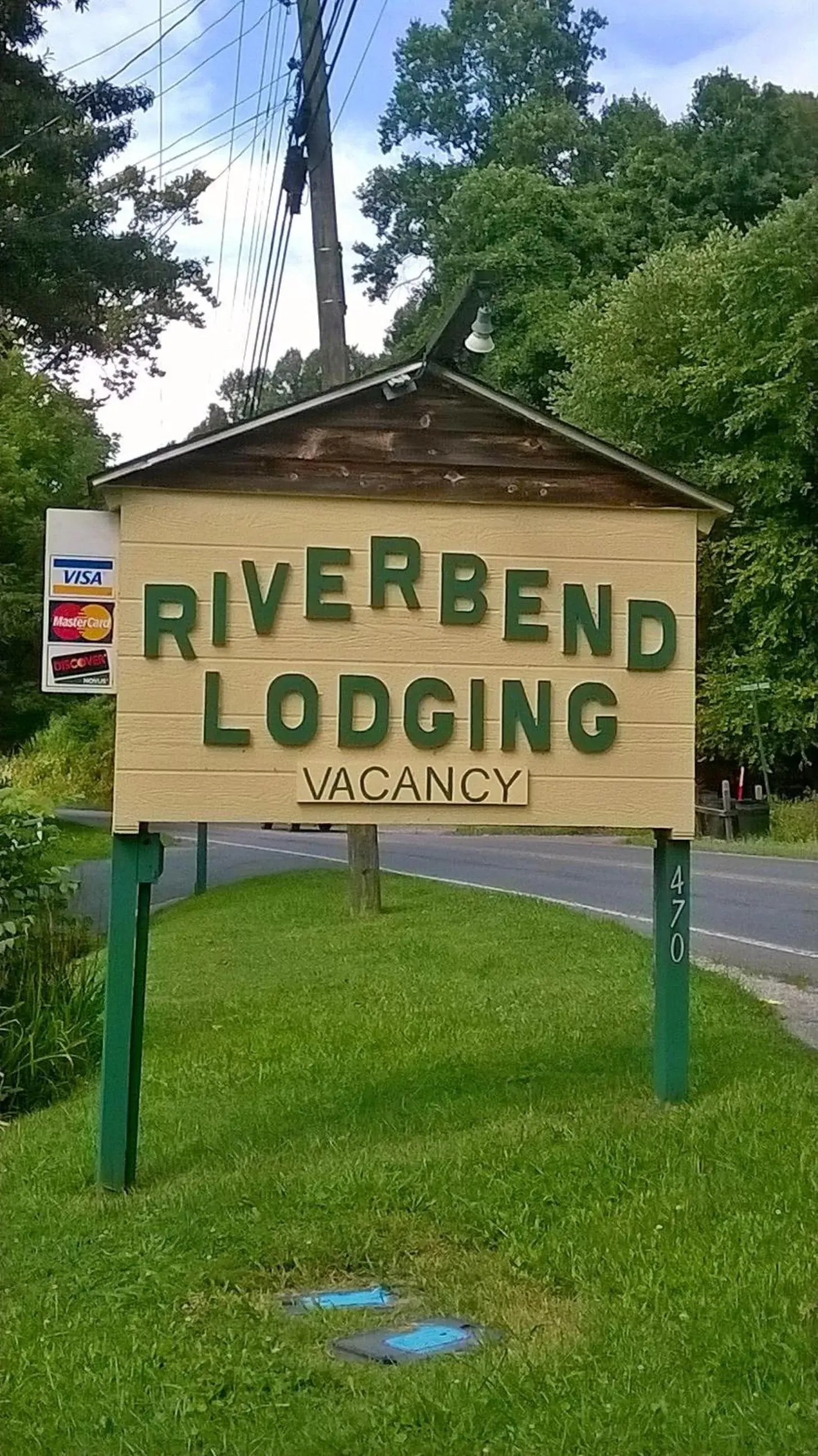 Property logo or sign in Riverbend Lodging