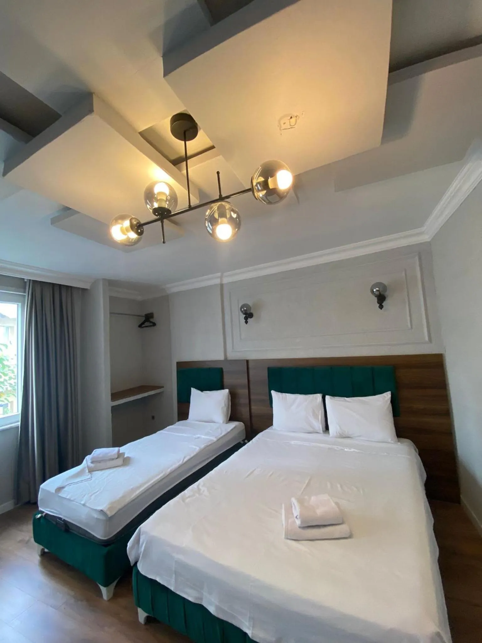 Bed in Aruna Boutique Hotel