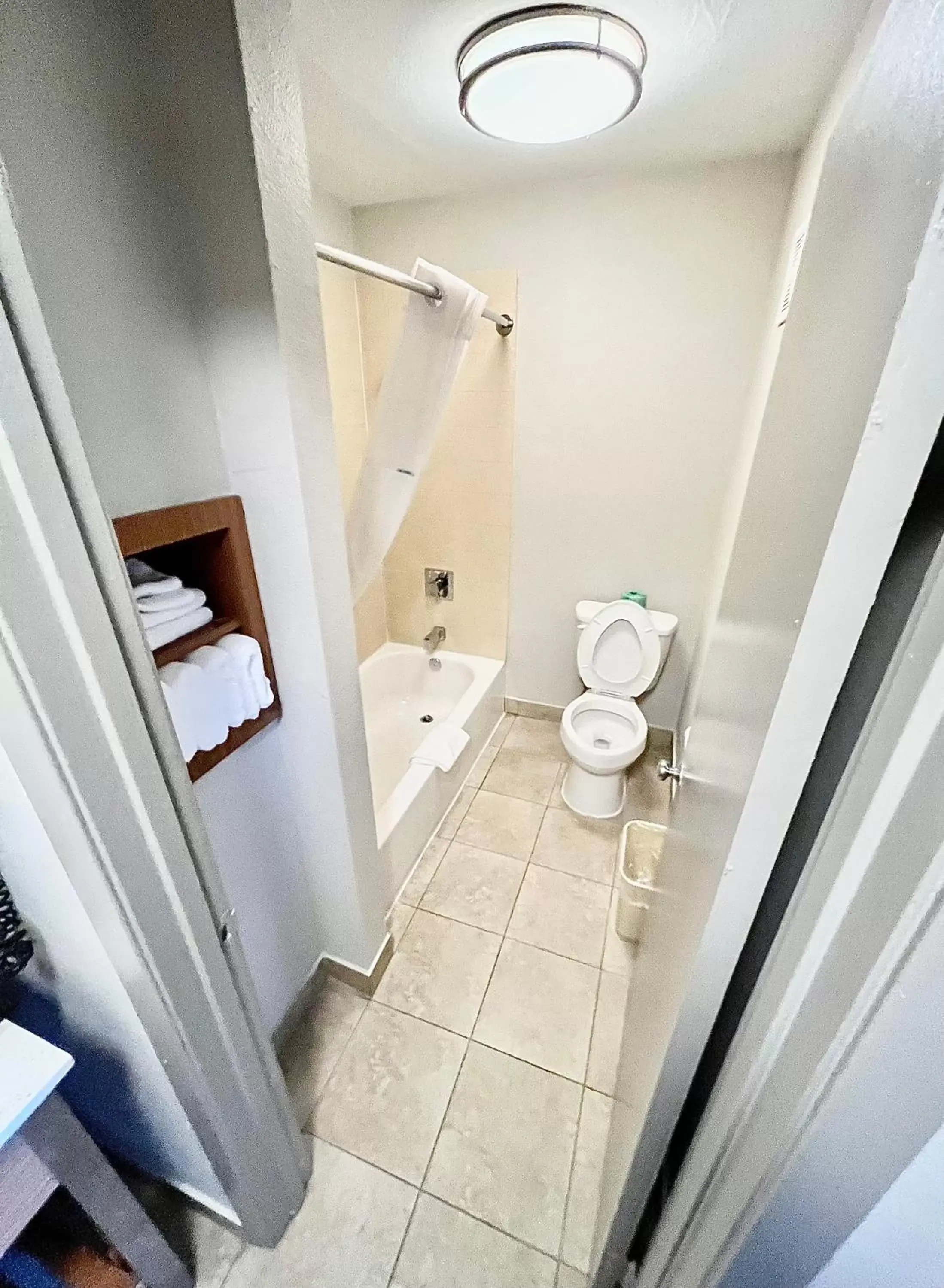 Shower, Bathroom in Days Inn & Suites by Wyndham Arlington Near Six Flags