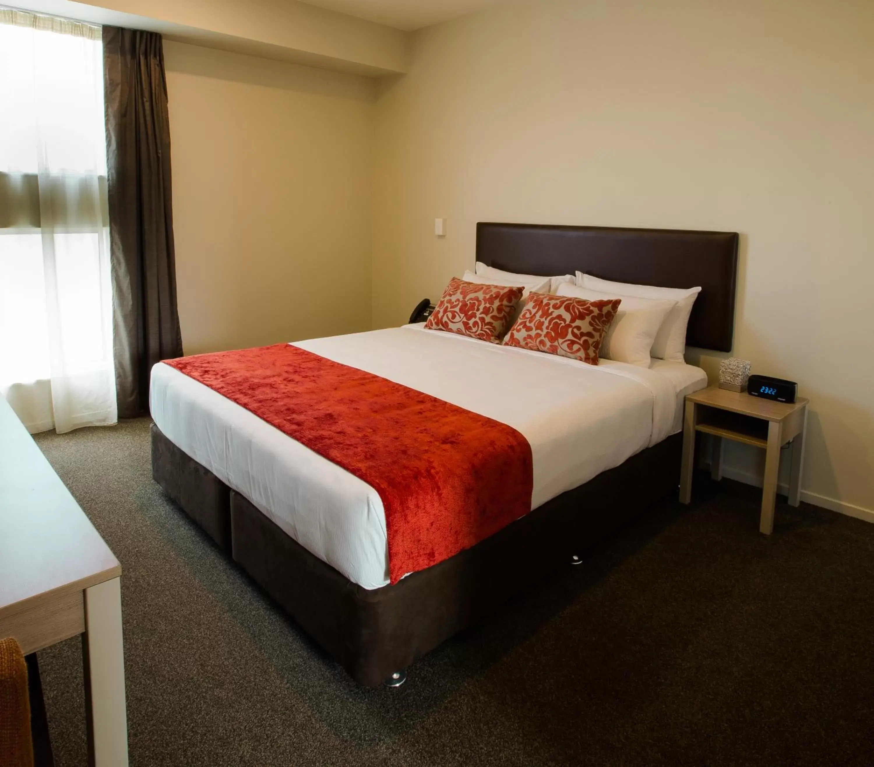 Bedroom, Bed in Ramada Suites by Wyndham Christchurch City