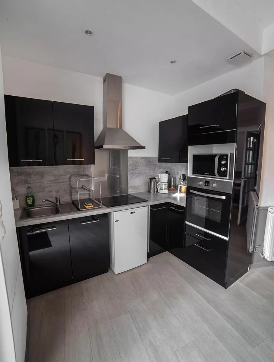 Kitchen or kitchenette in Bienvenue Chez Nous