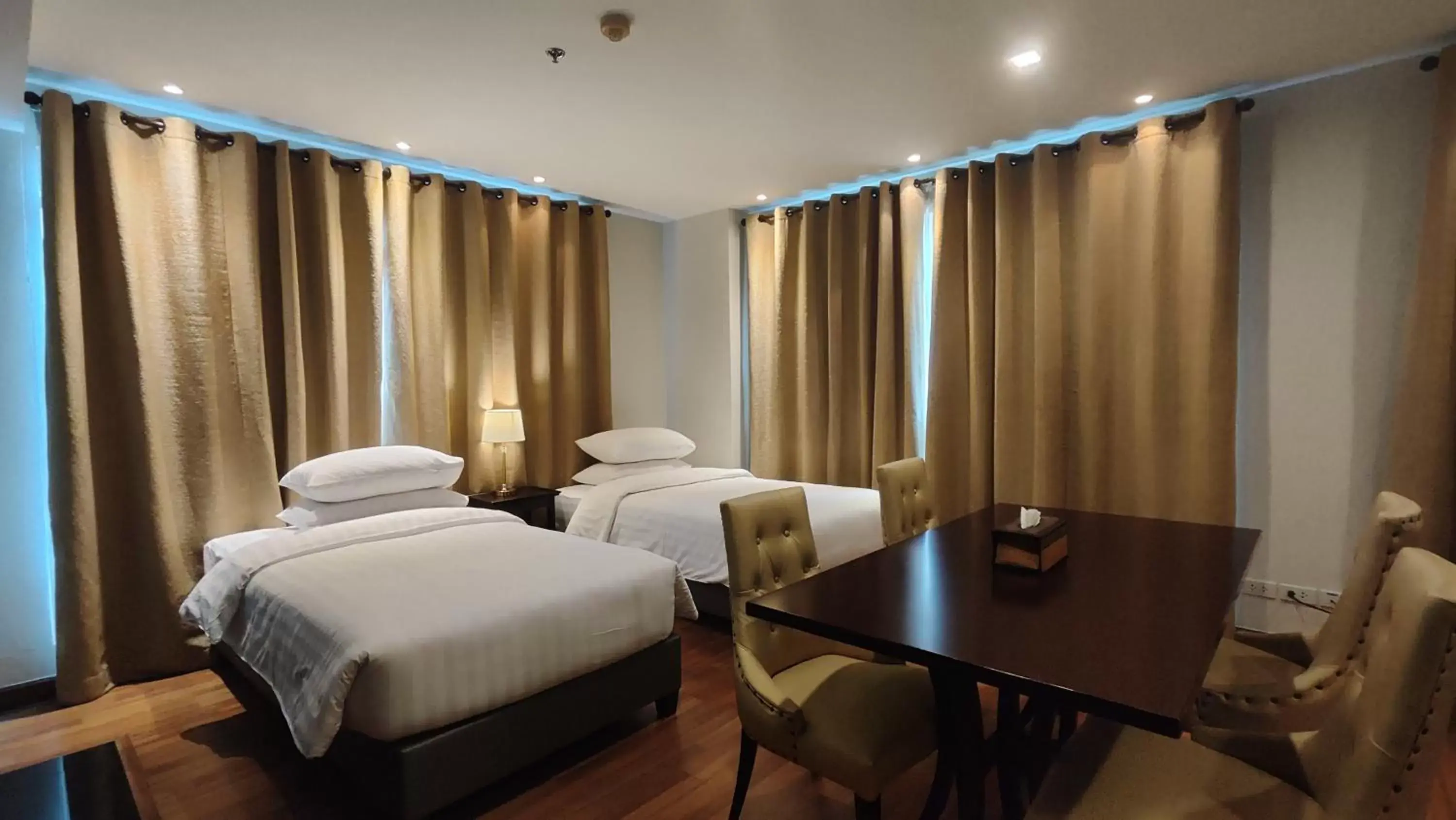 Living room, Bed in The Bless Hotel and Residence