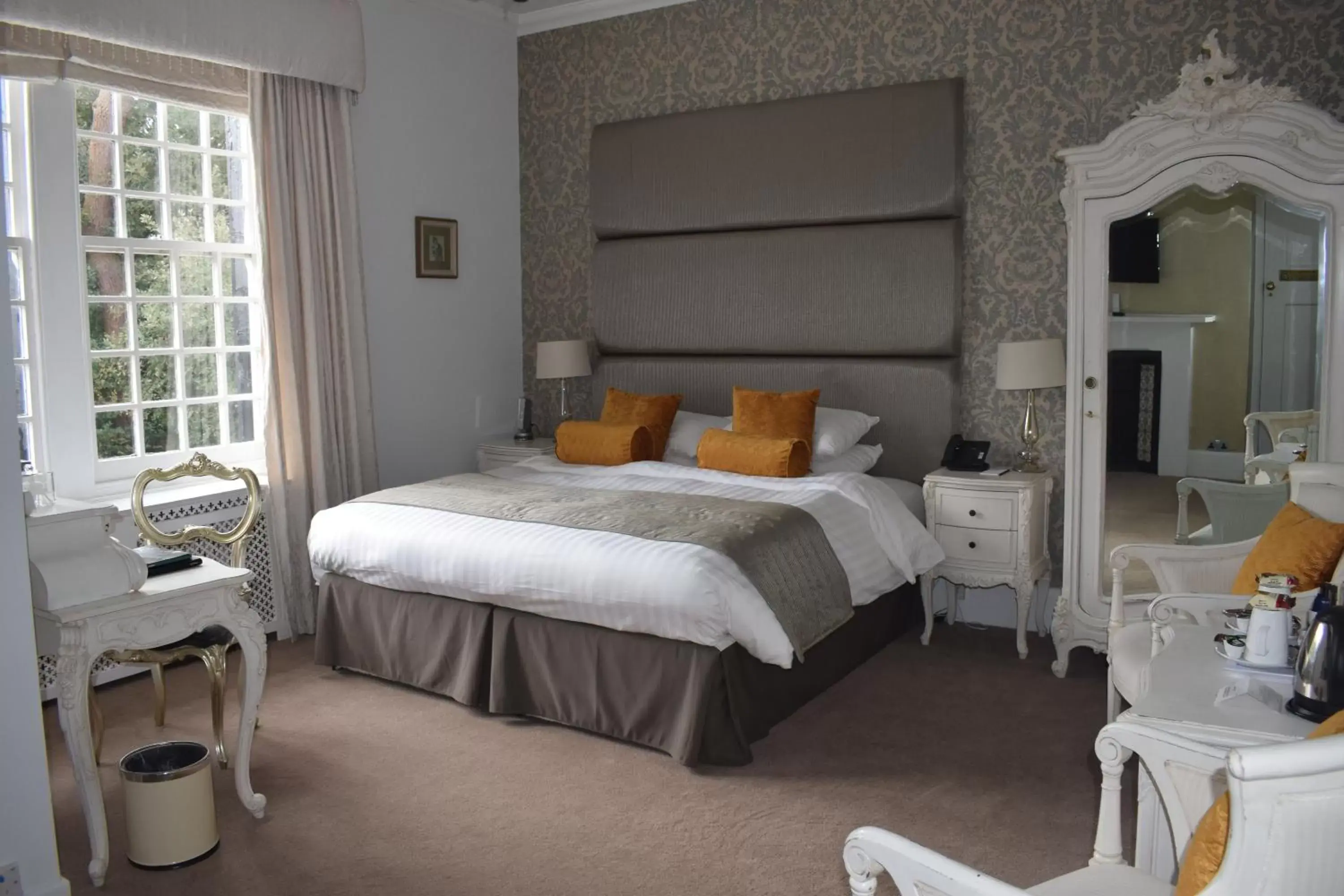 Bed in Langtry Manor Hotel