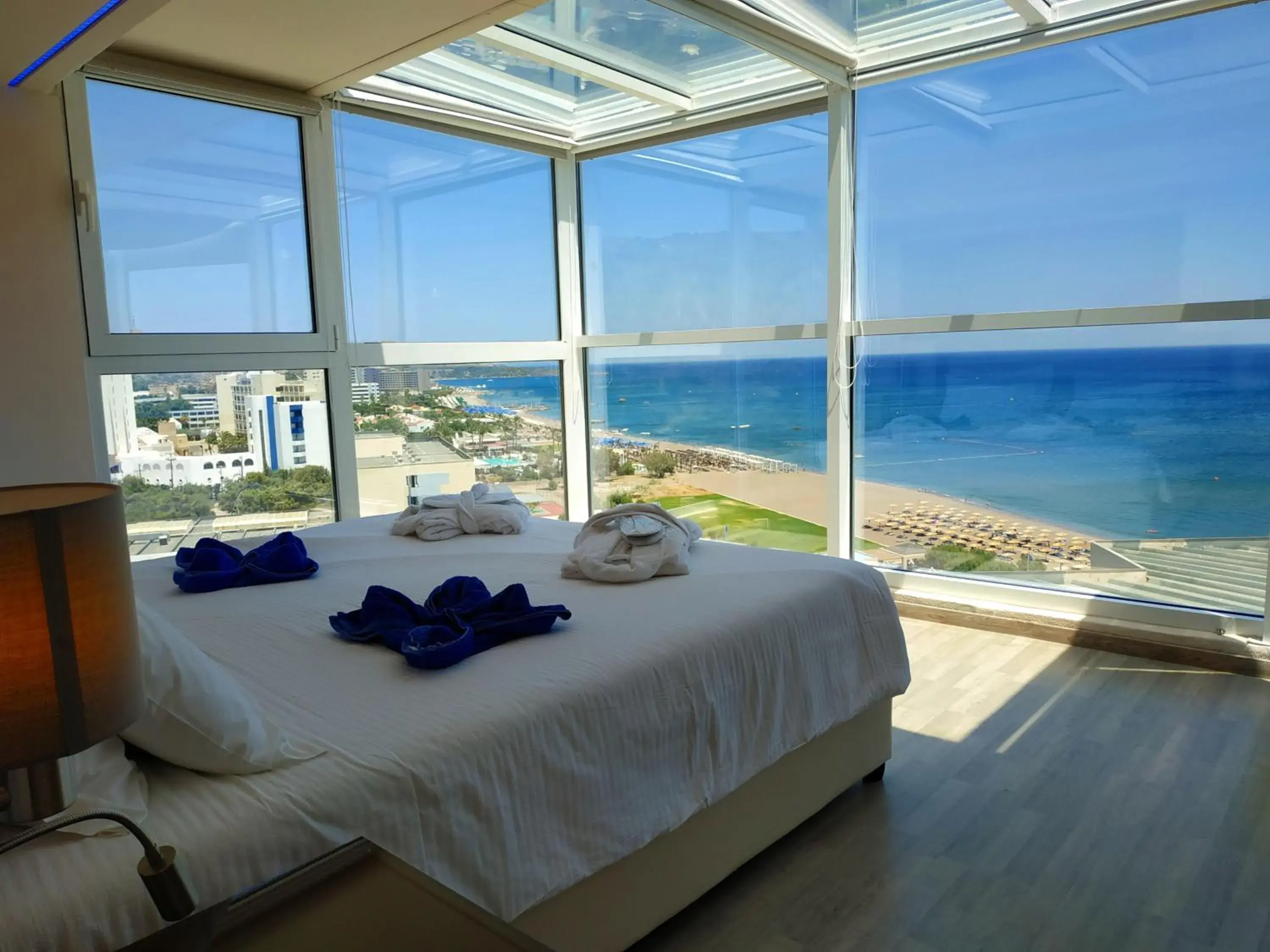 Bedroom in Pegasos Deluxe Beach Hotel