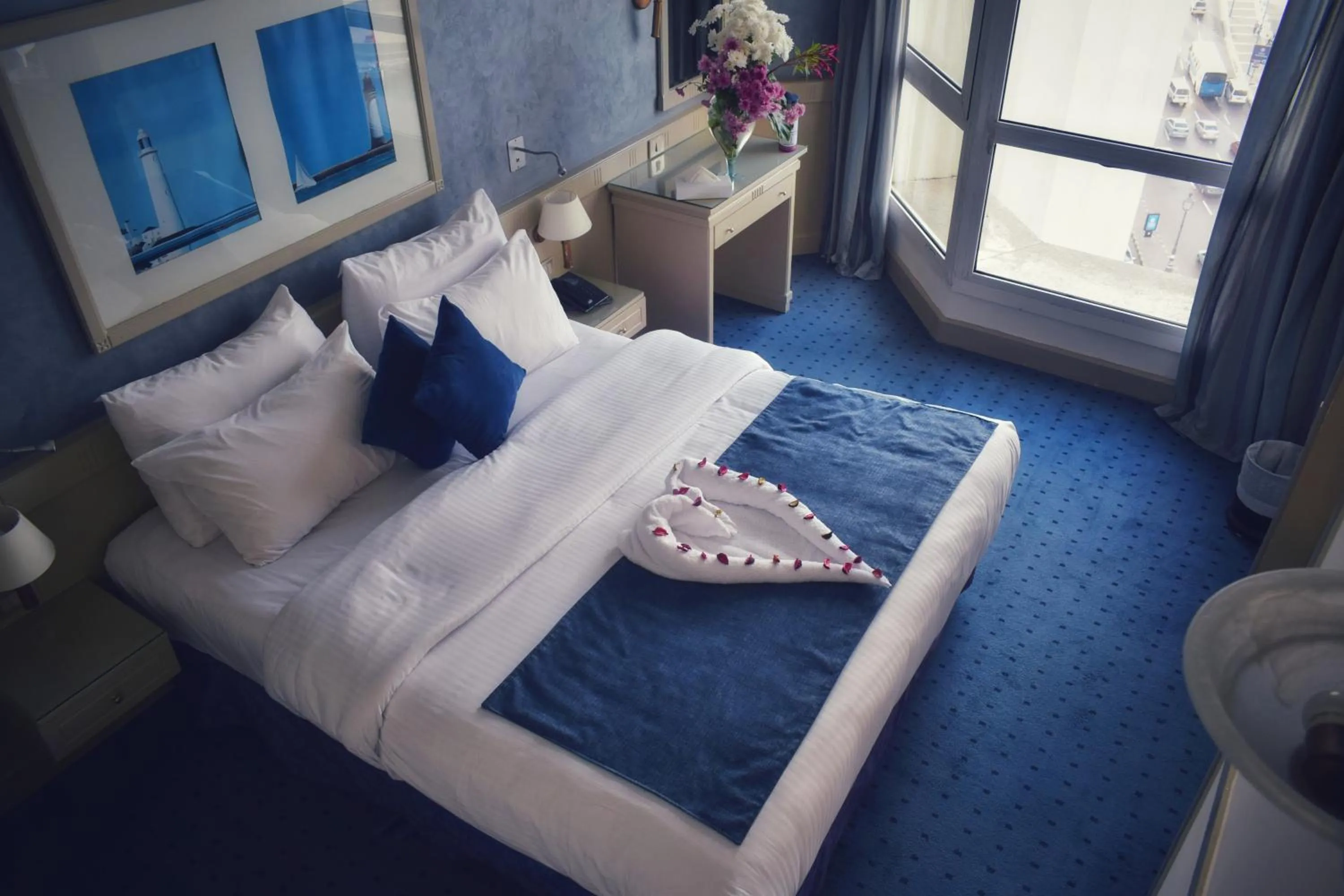 Bed in Romance Alexandria Hotel