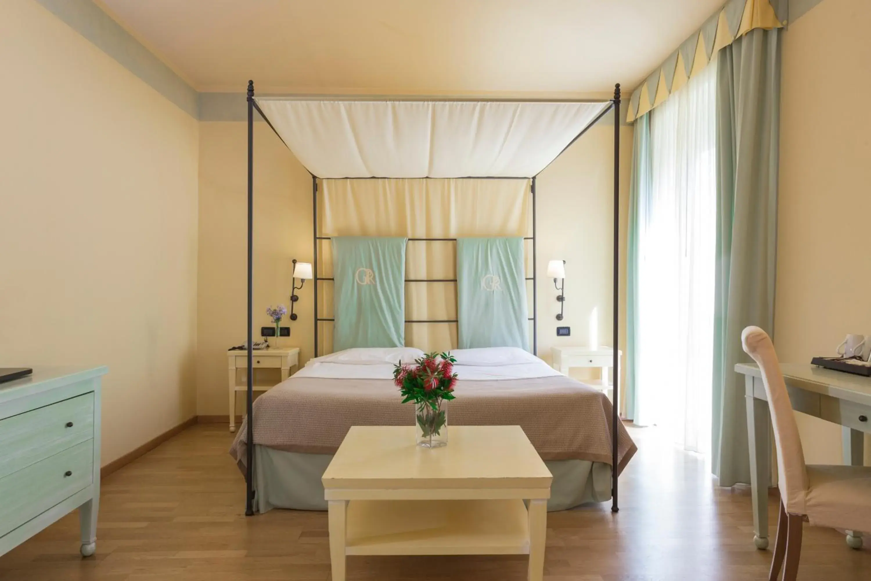 Bed, Bathroom in TH Tirrenia - Green Park Resort