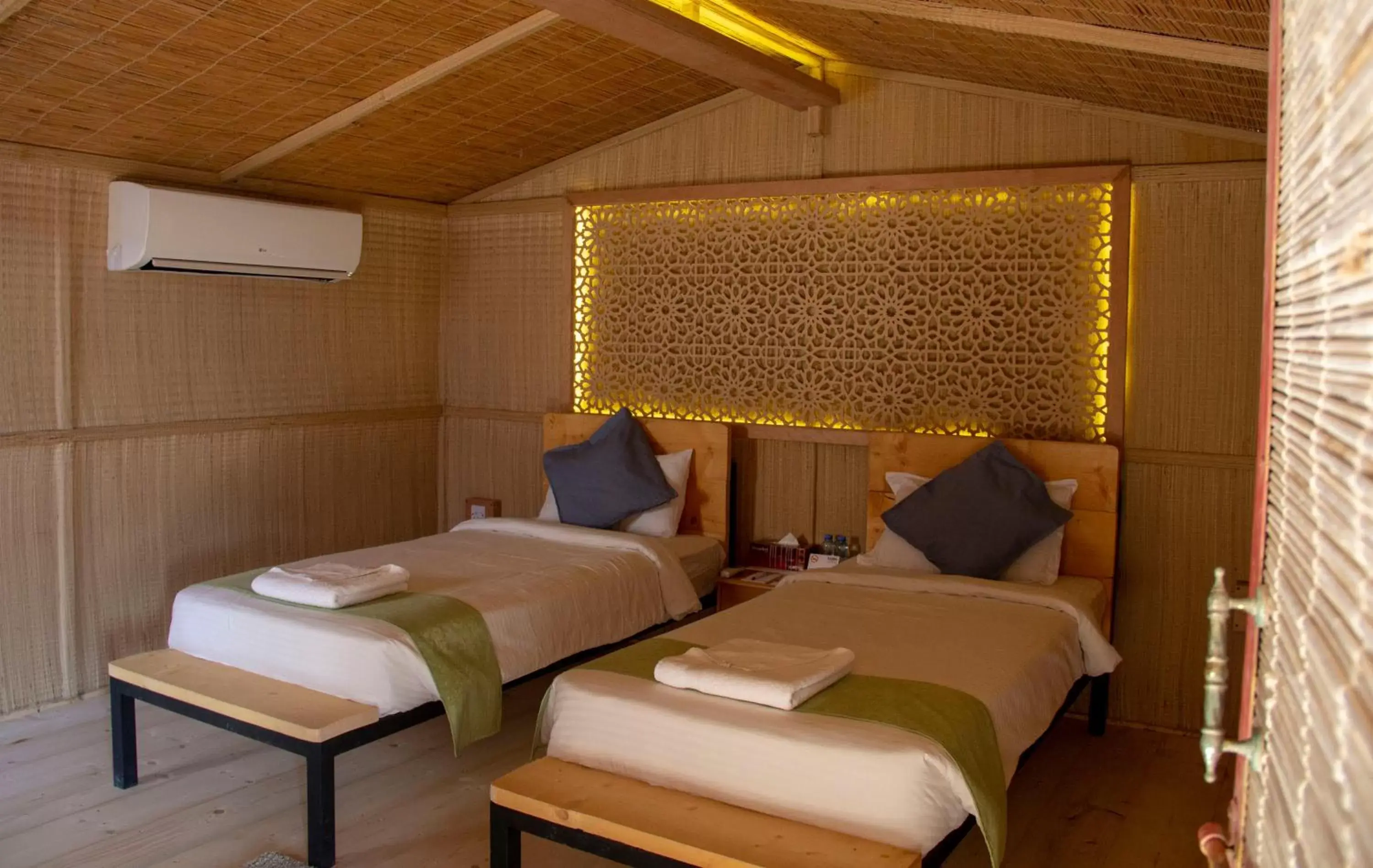 Bedroom, Bed in SAMA Ras Al Jinz Resort