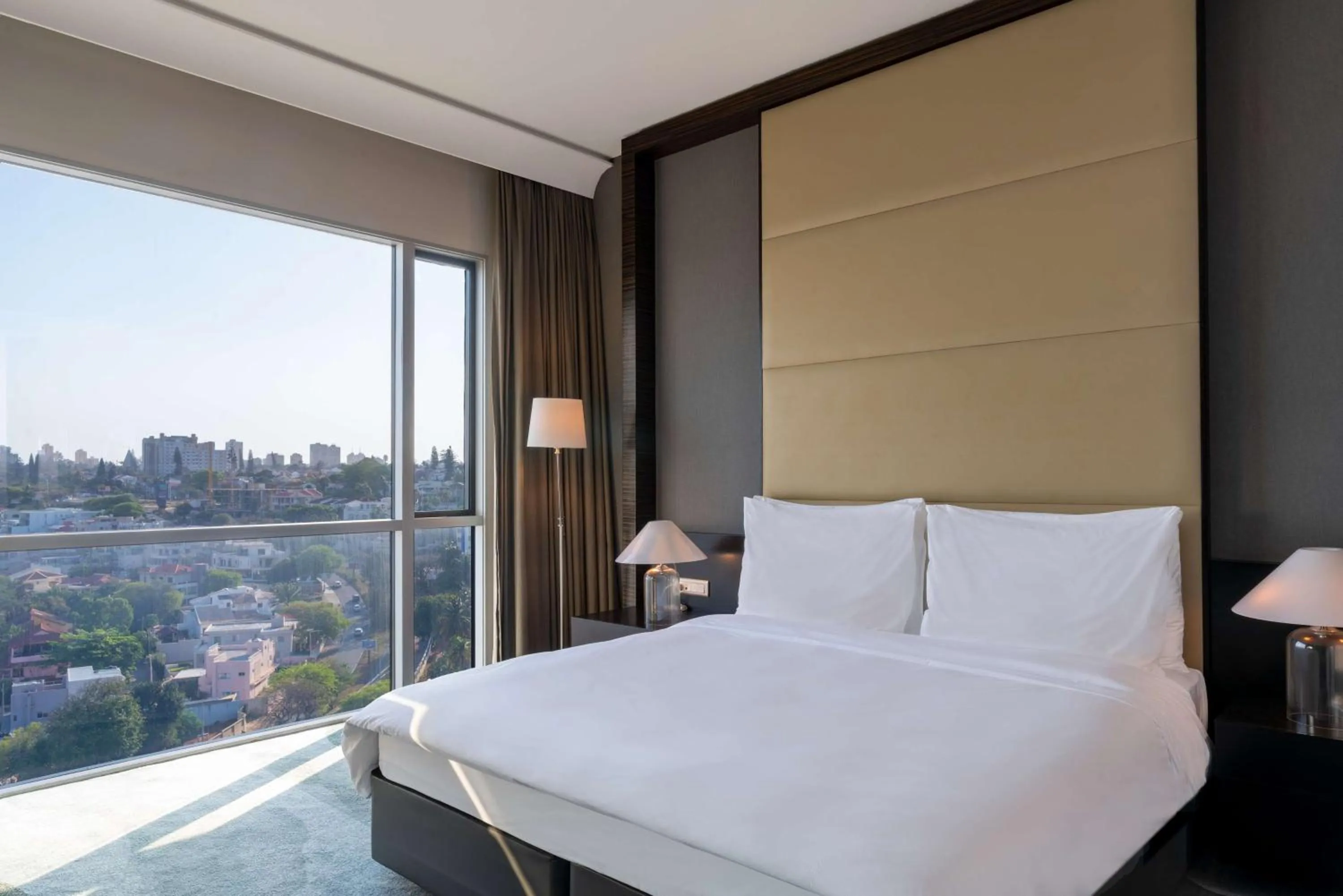 Photo of the whole room, Bed in Radisson Blu Hotel & Residence Maputo