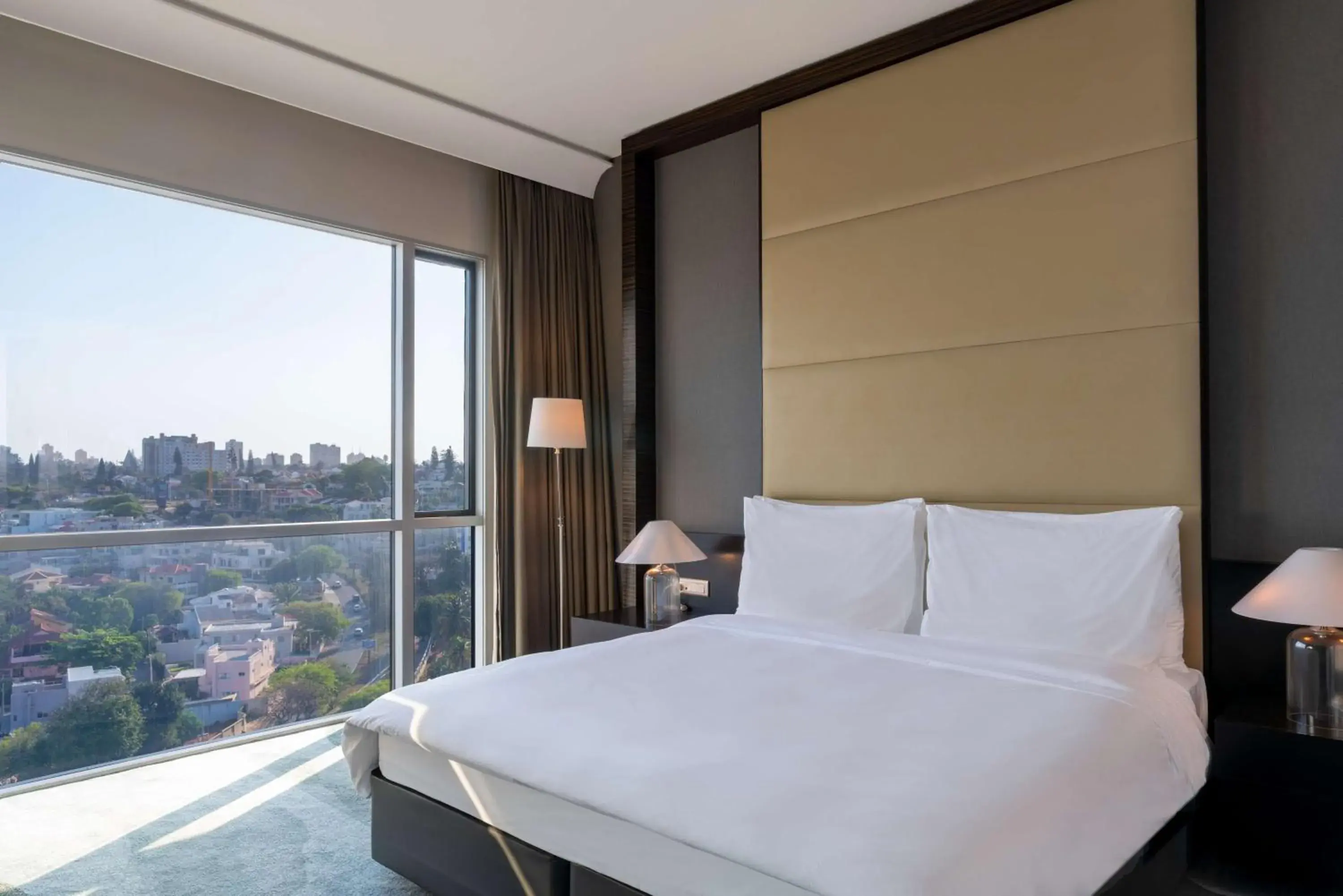 Photo of the whole room, Bed in Radisson Blu Hotel & Residence Maputo Photo of the whole room, Bed in Radisson Blu Hotel & Residence Maputo