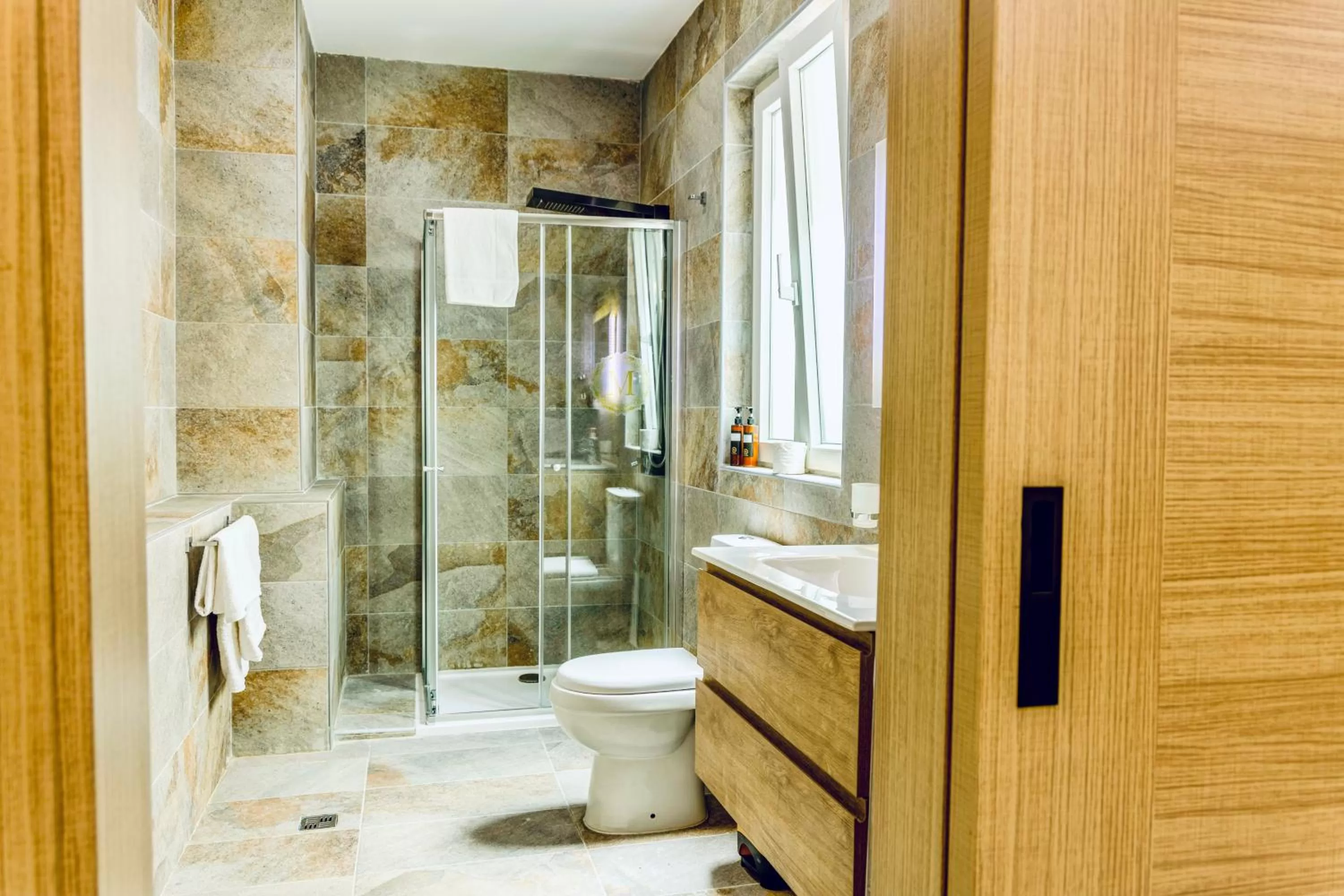 Shower in The Mike Hotel by CX Collection