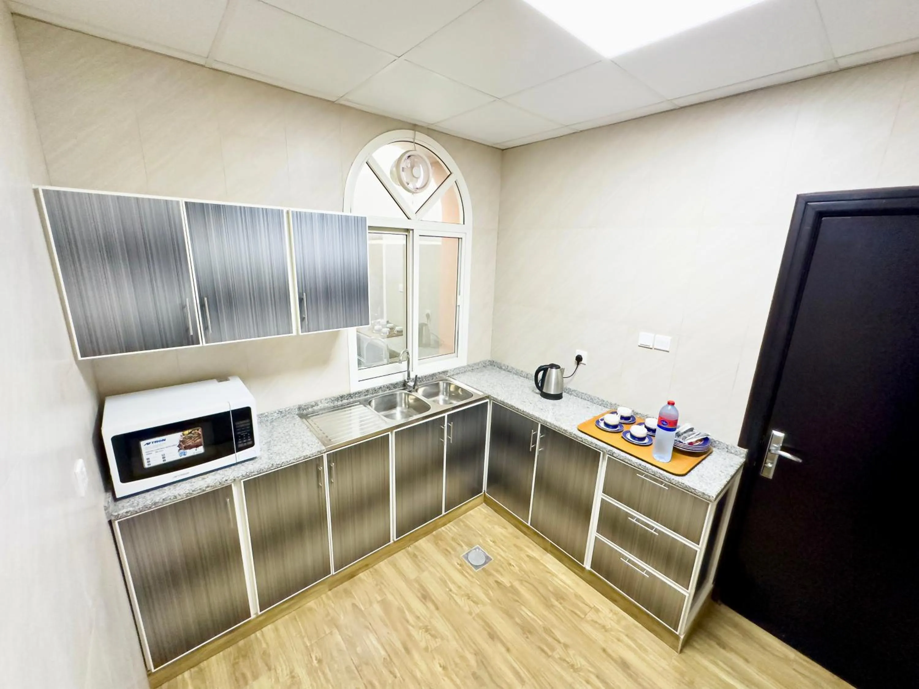 Kitchen or kitchenette in Royal Residence Hotel Apartments