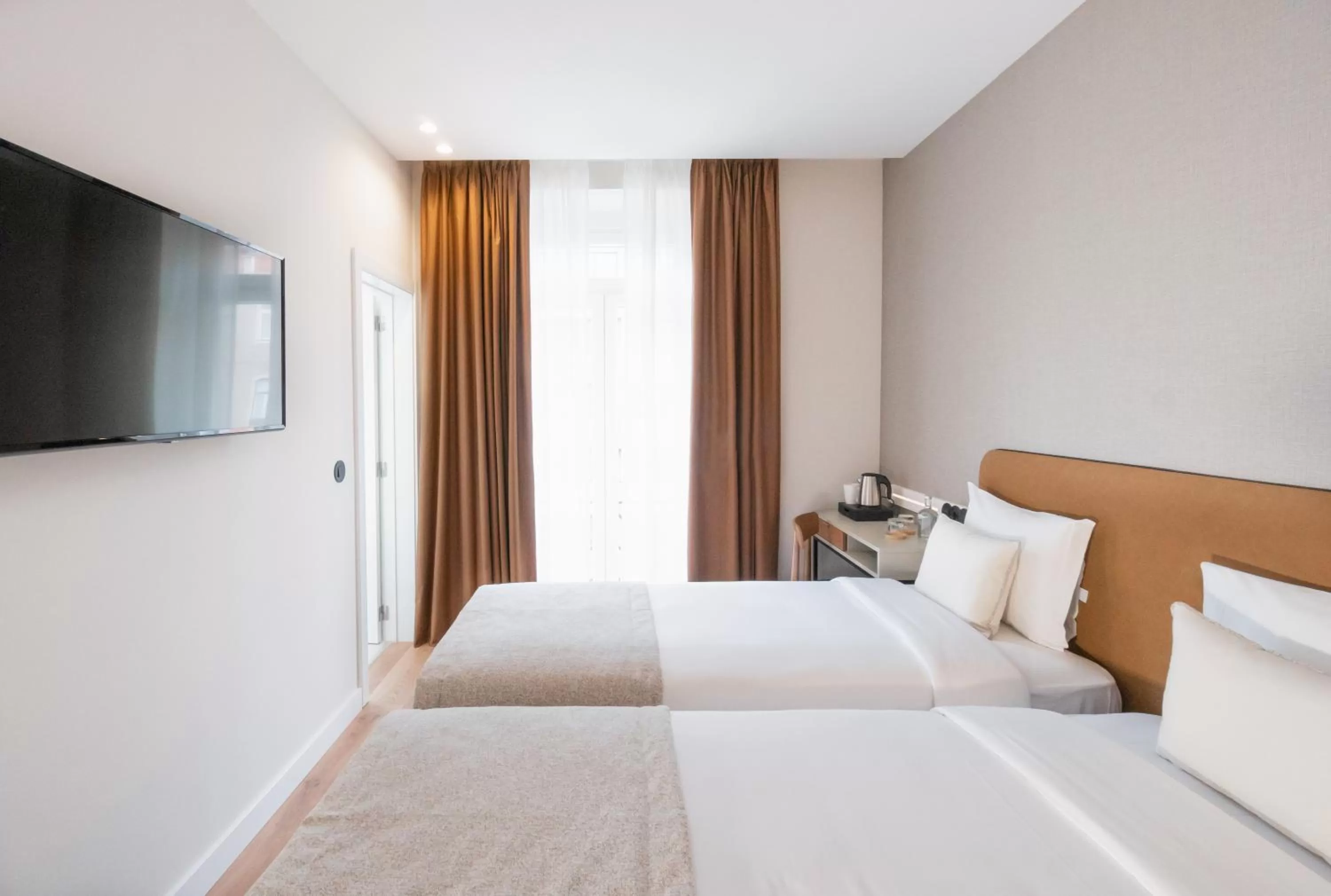 Bed in LX SoHo Boutique Hotel by RIDAN Hotels