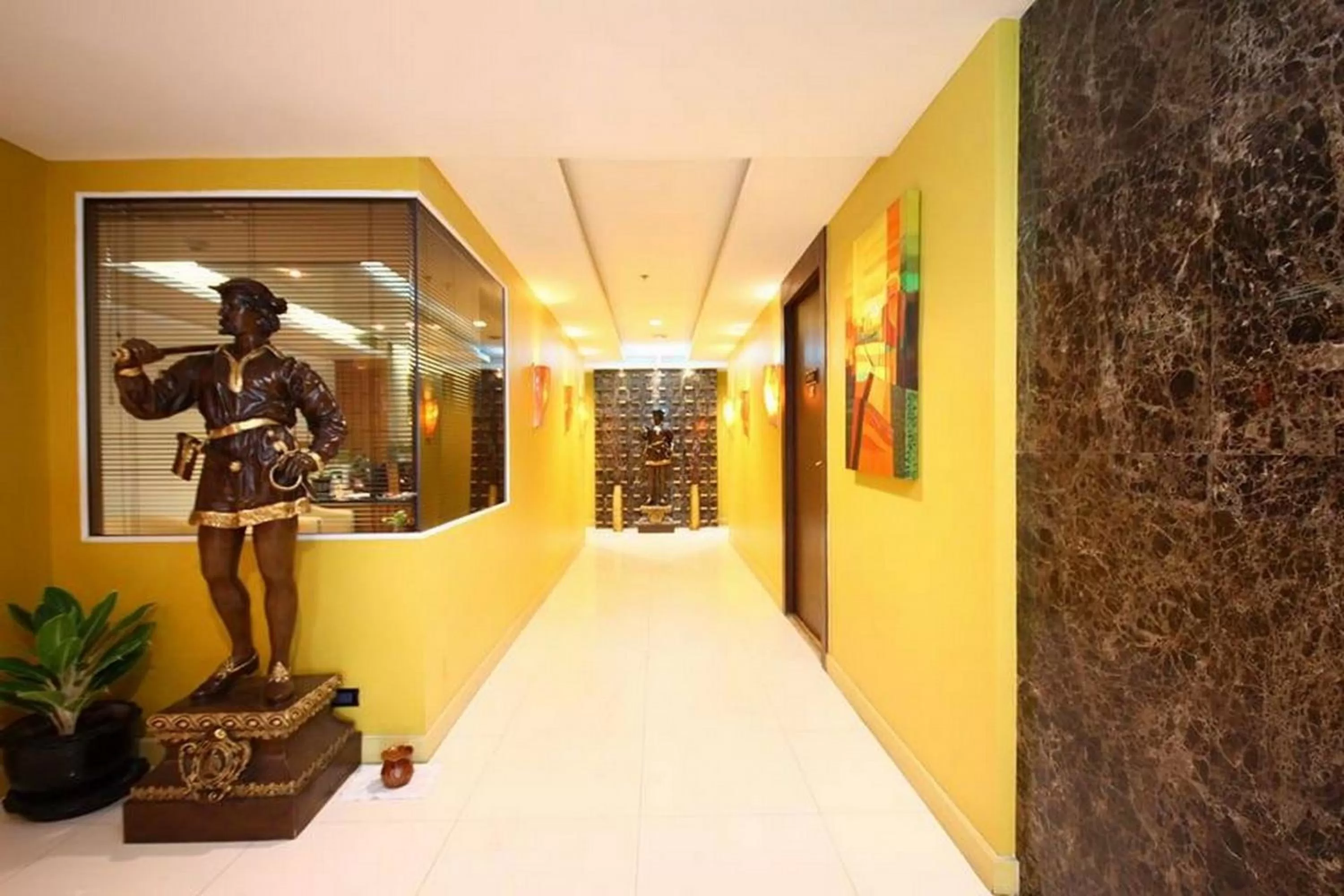 Communal lounge/ TV room in Nova Gold Hotel Pattaya