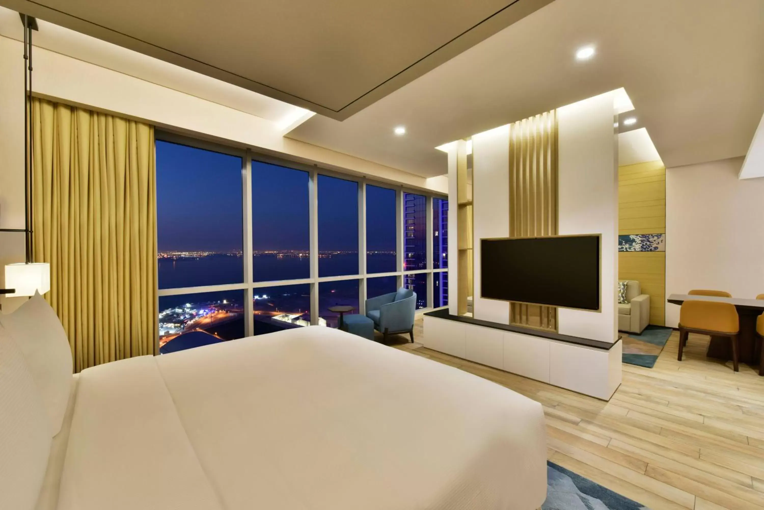 Bedroom, TV/Entertainment Center in Hilton Bahrain