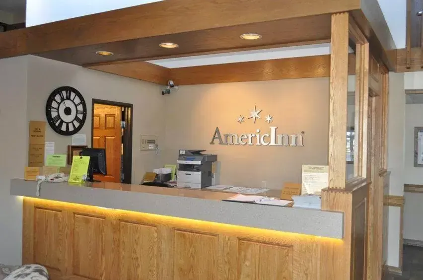 Lobby/Reception in AmericInn by Wyndham Plymouth