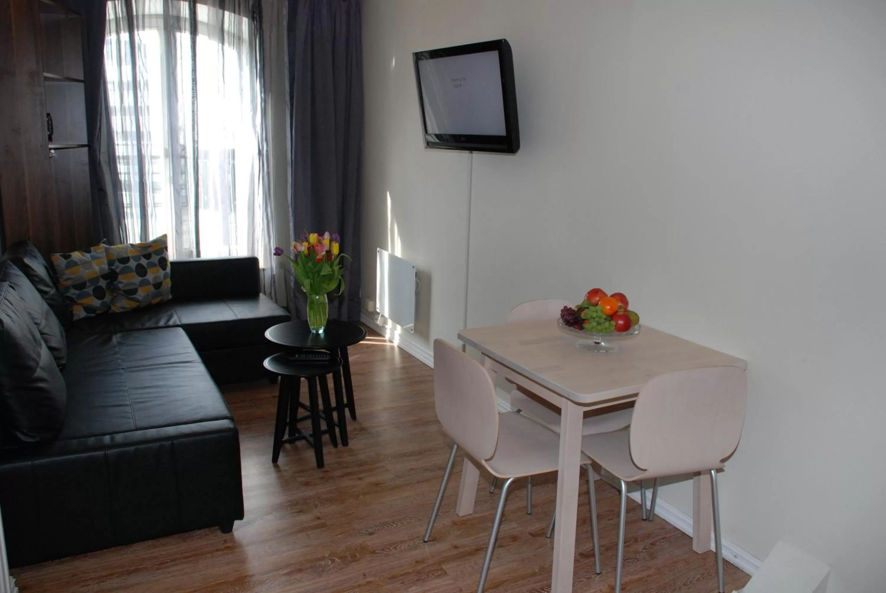 Living room in Central City Apartments