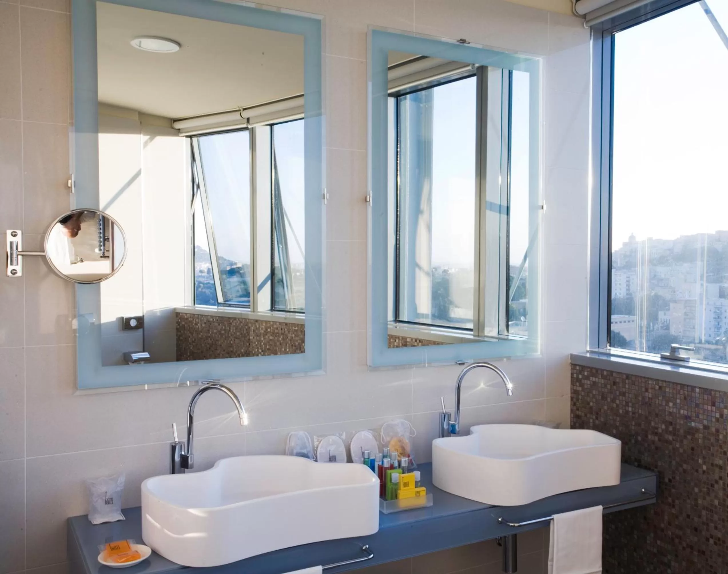 Bathroom in UNA HOTELS T Hotel Cagliari