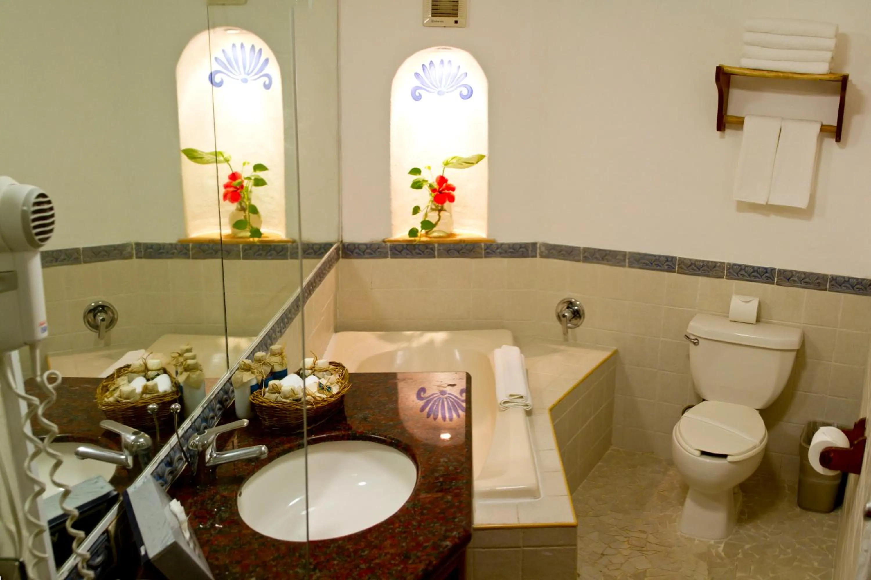 Toilet in Casa del Mar Cozumel Hotel & Dive Resort with free access to an exclusive beach club