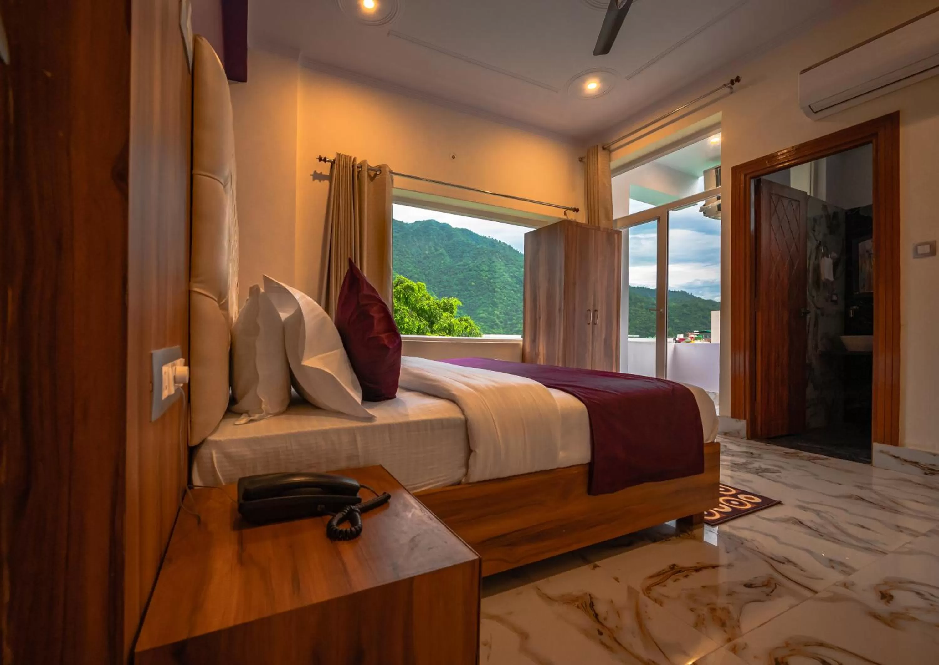 Bed in Hotel Rishikesh Grand by Kool Stays