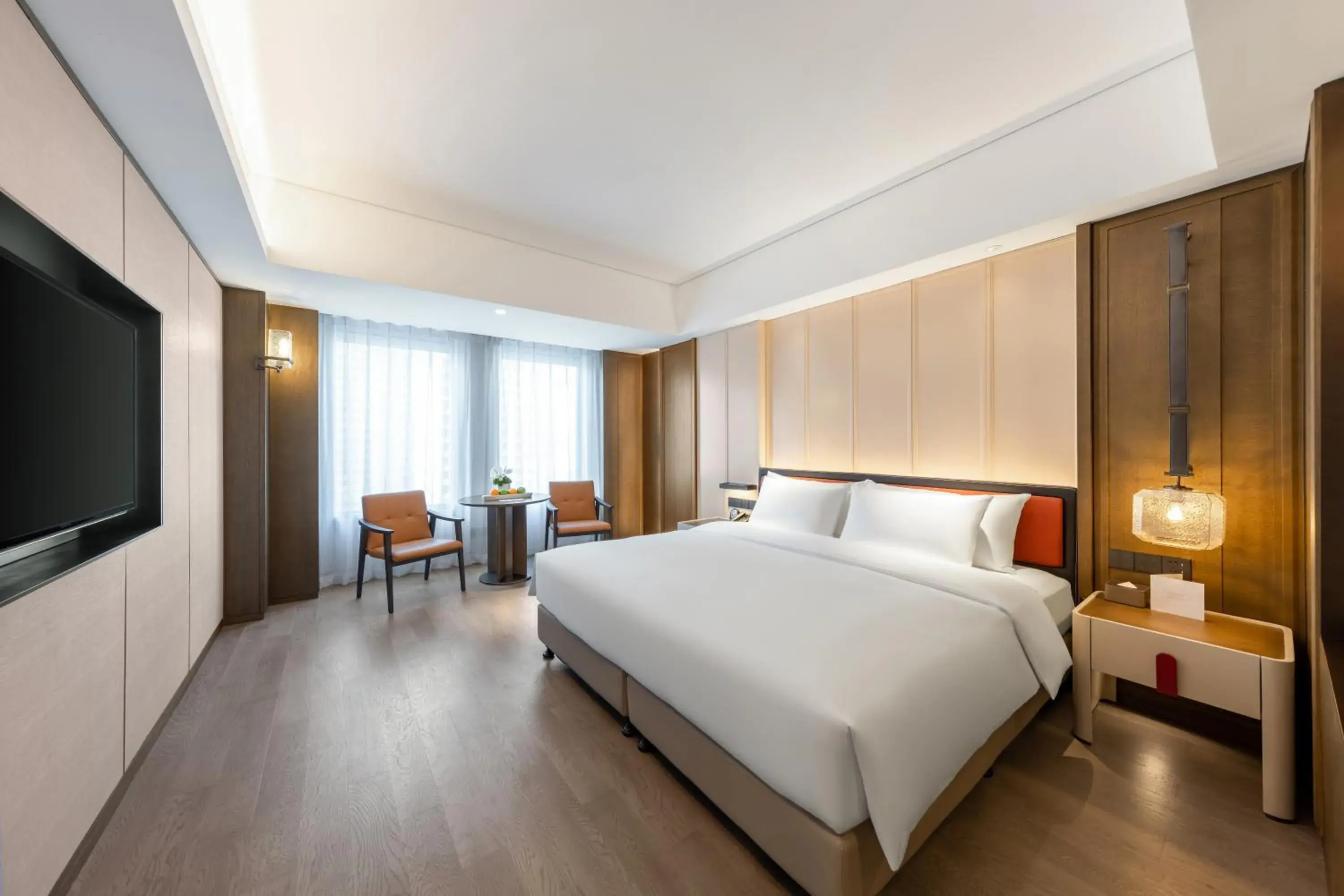 Photo of the whole room, Bed in Swissôtel Shenyang