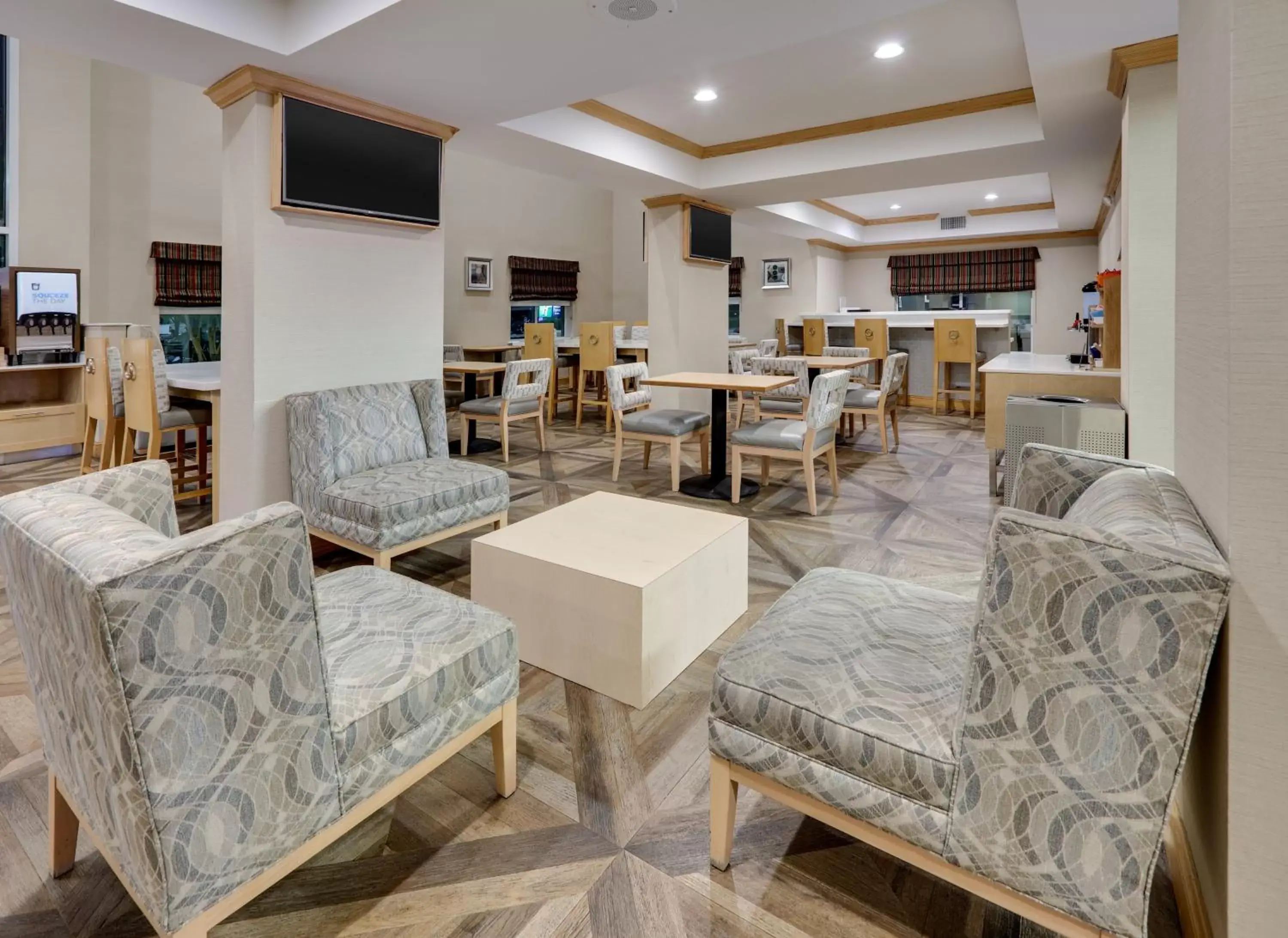 Property building, Seating Area in Holiday Inn Express & Suites San Antonio Brooks City Base, an IHG Hotel