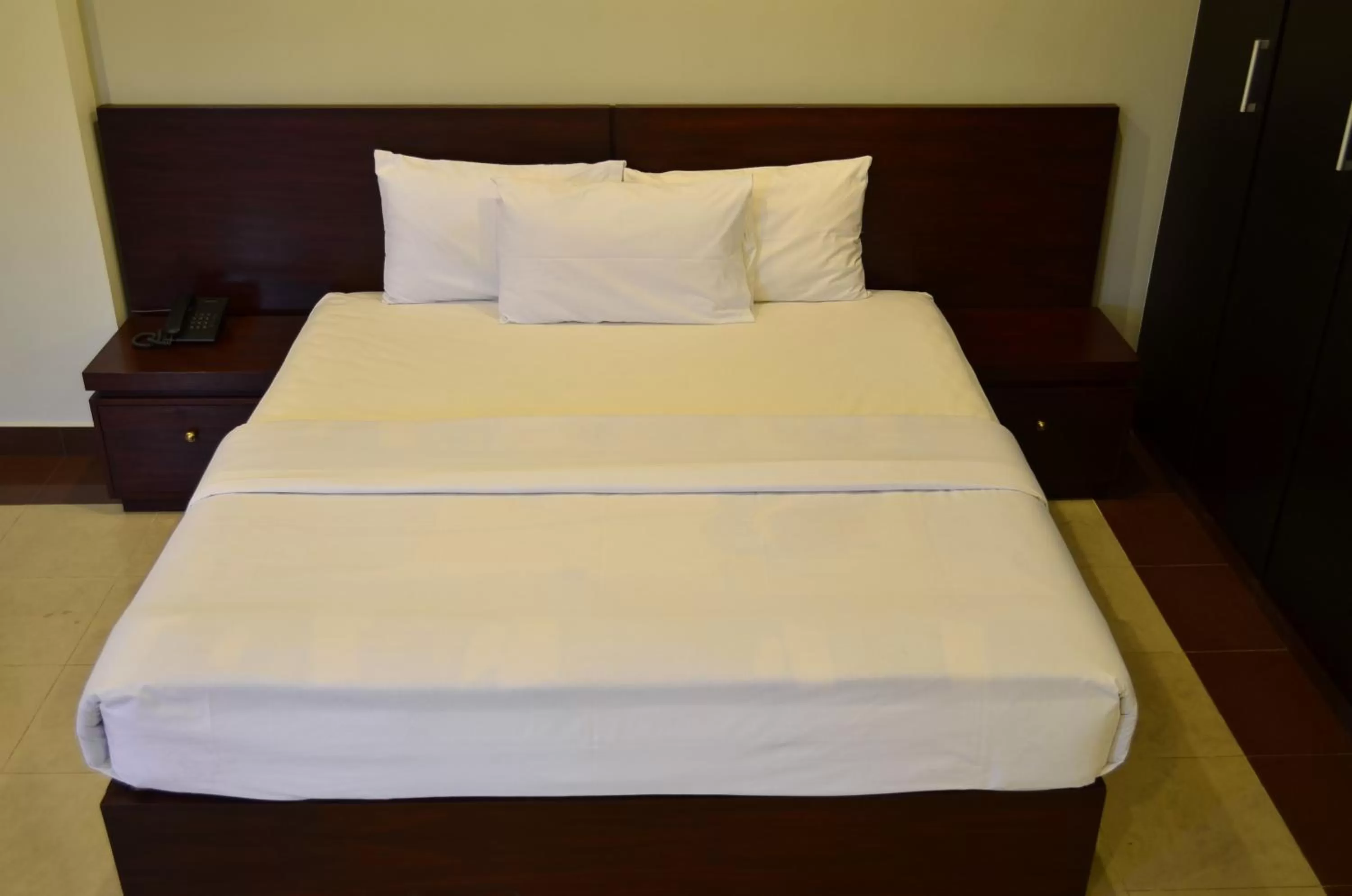 Bed in Hotel Multan Continental