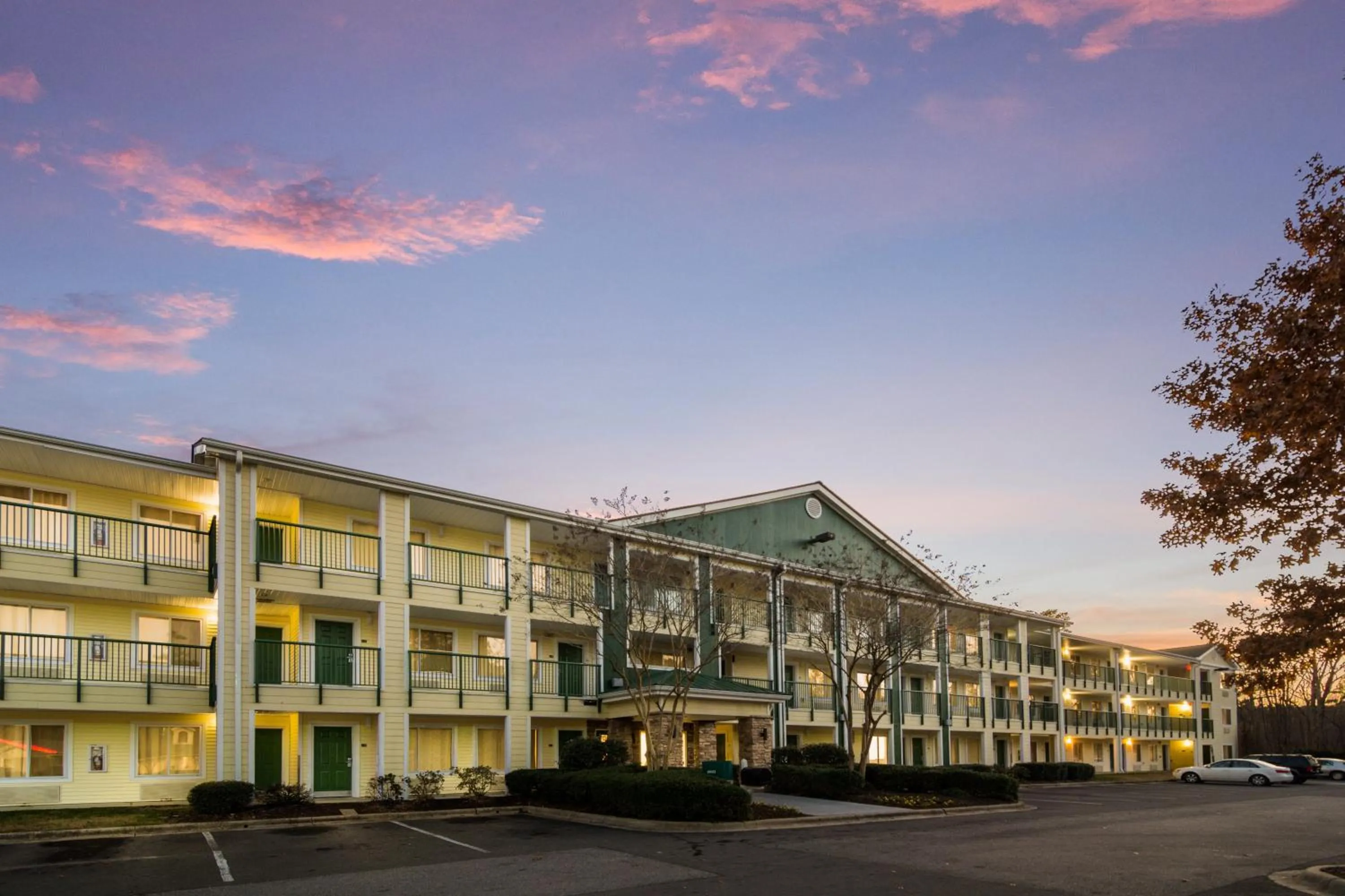 Property building in HomeTowne Studios by Red Roof Raleigh – Durham