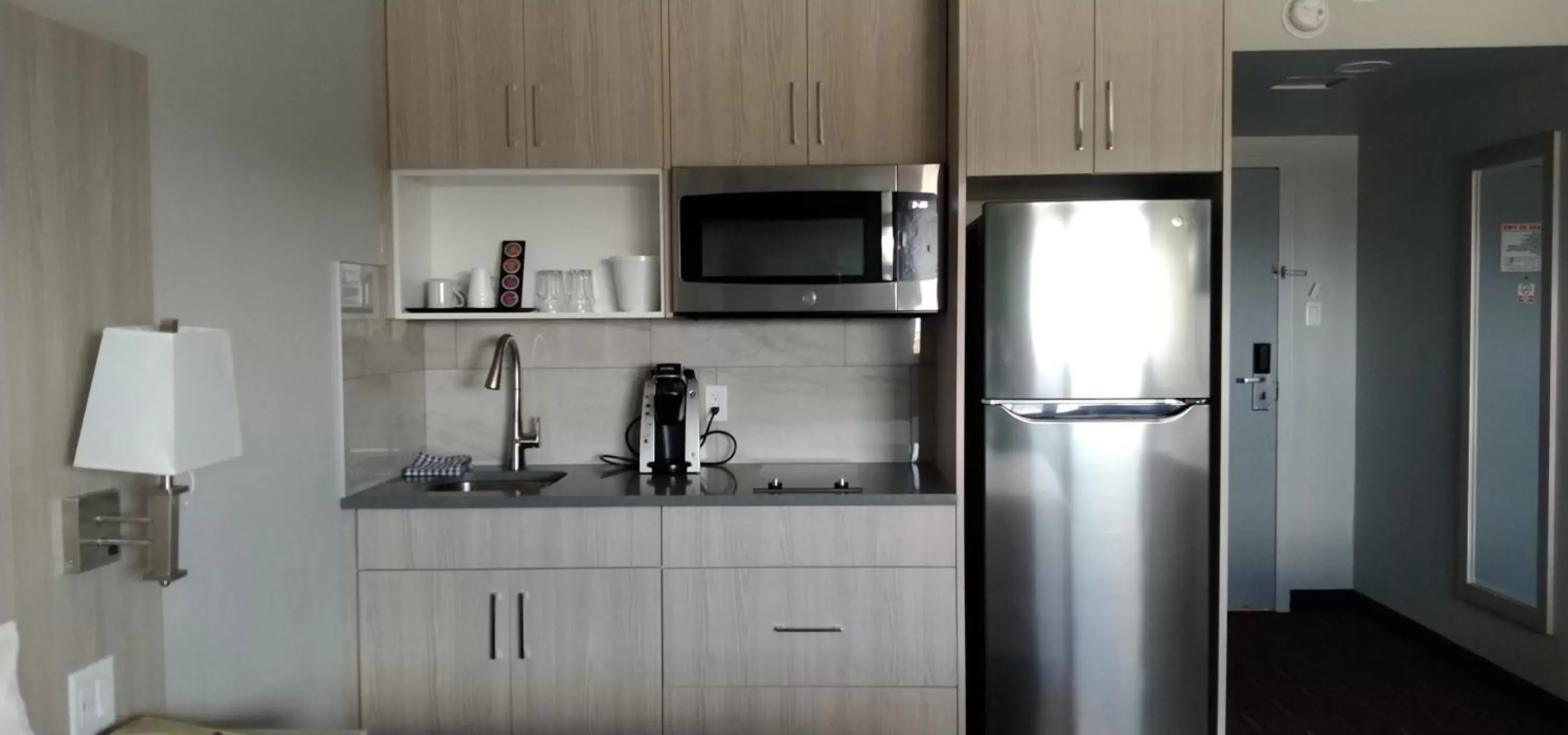 Kitchen or kitchenette, Kitchen/Kitchenette in Wyndham Garden Medicine Hat Conference Center