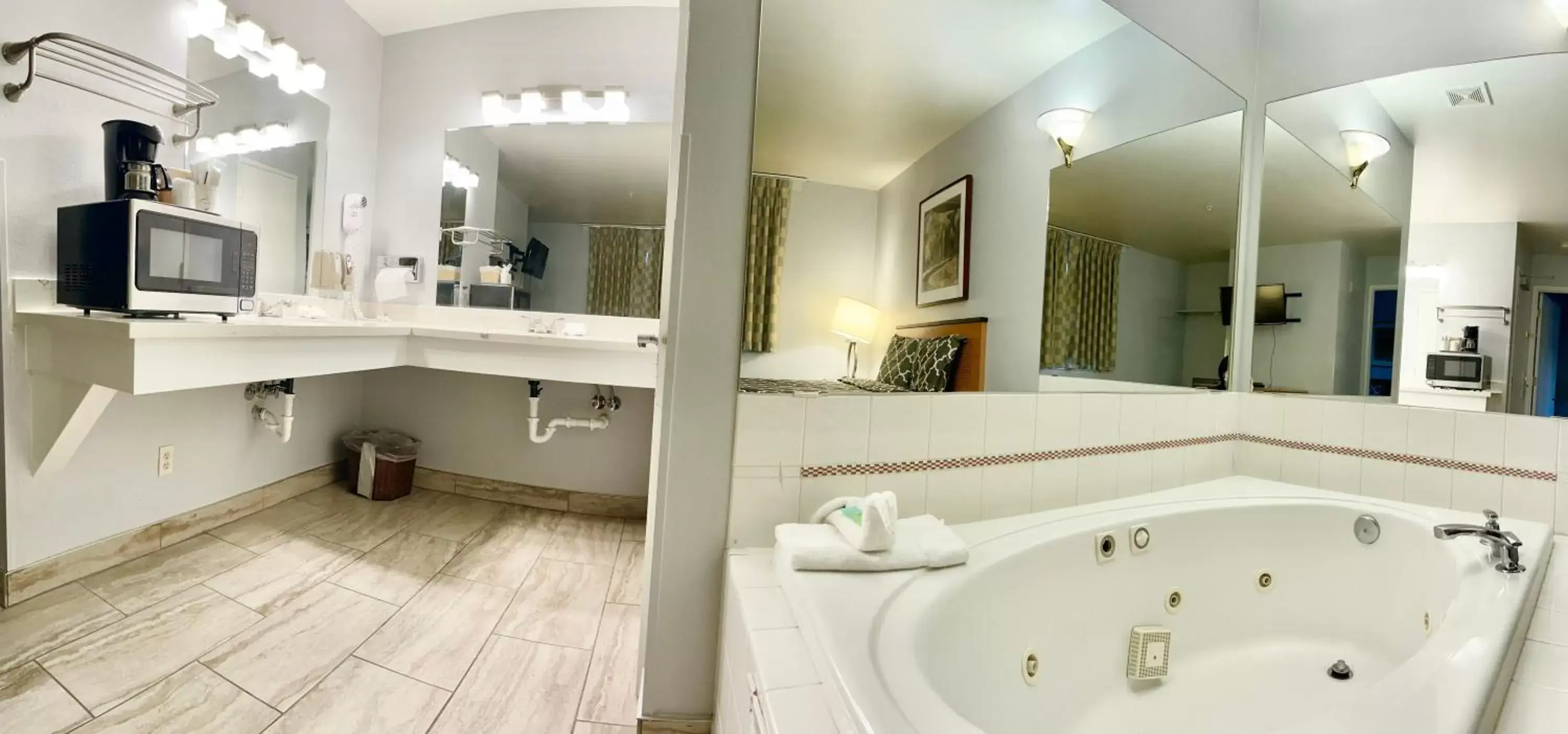 Bathroom in Americas Inn & Suite