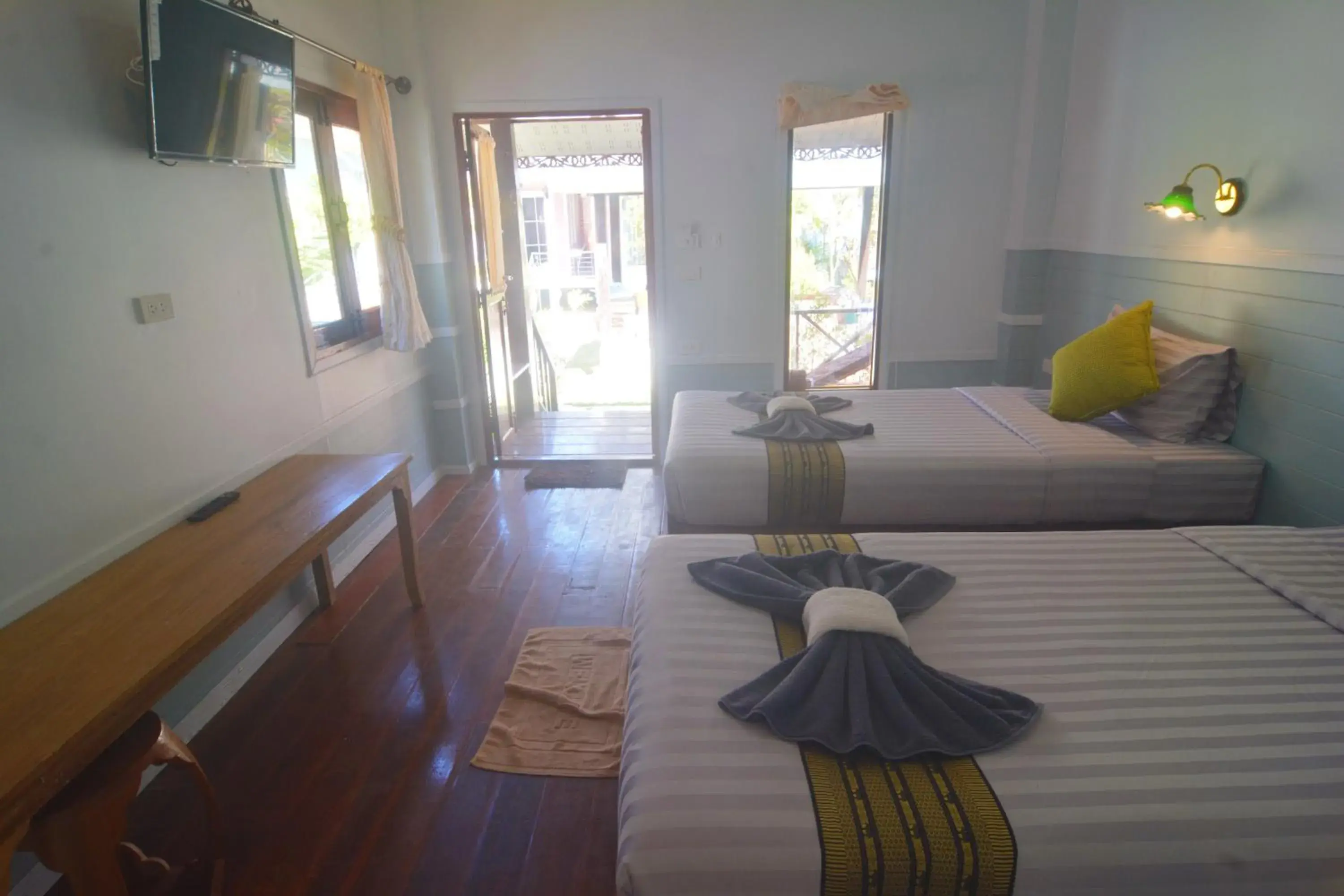 Bed, Seating Area in My Home Lantawadee Resort