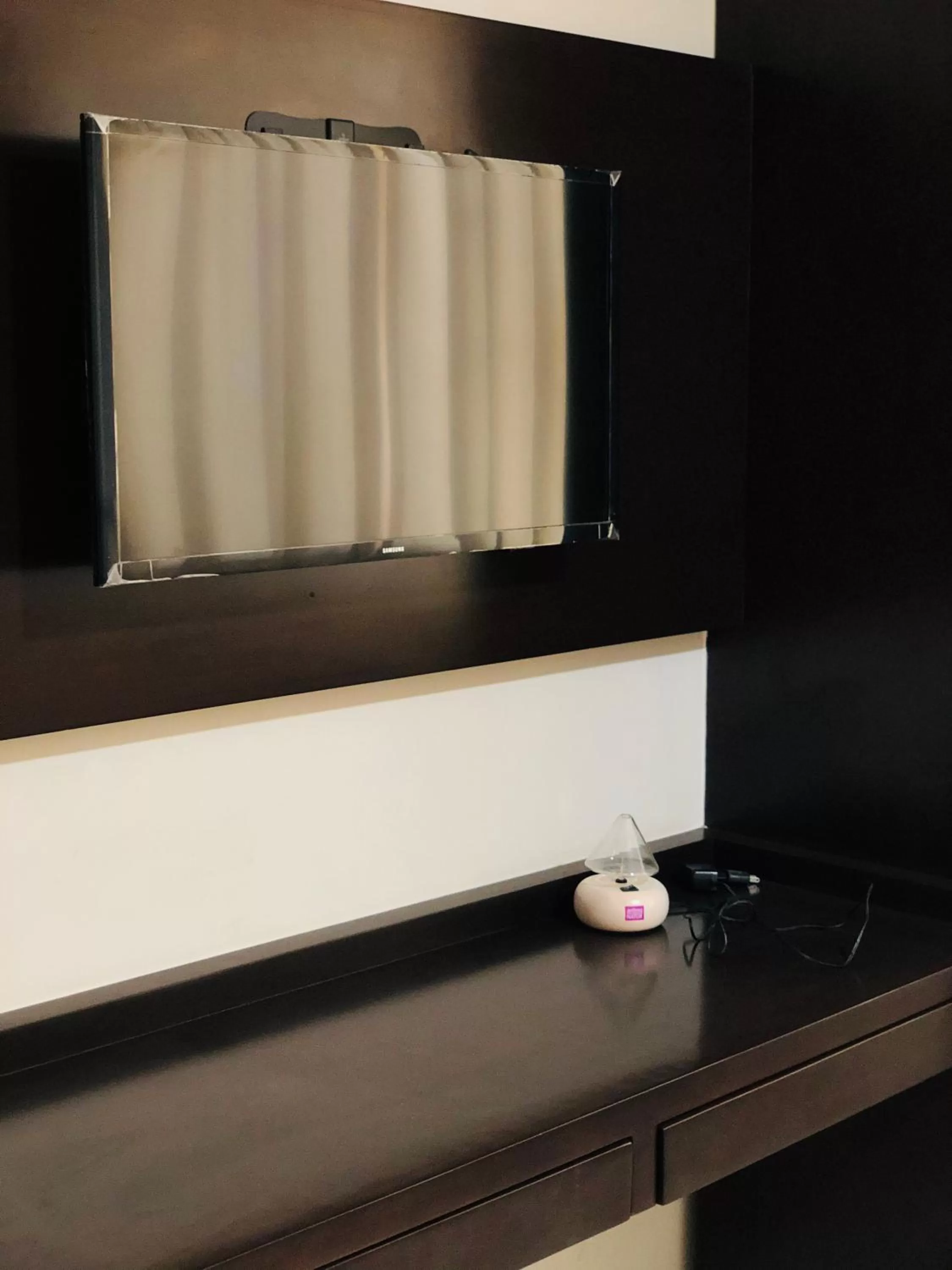 TV and multimedia, Bathroom in Suites San Luis