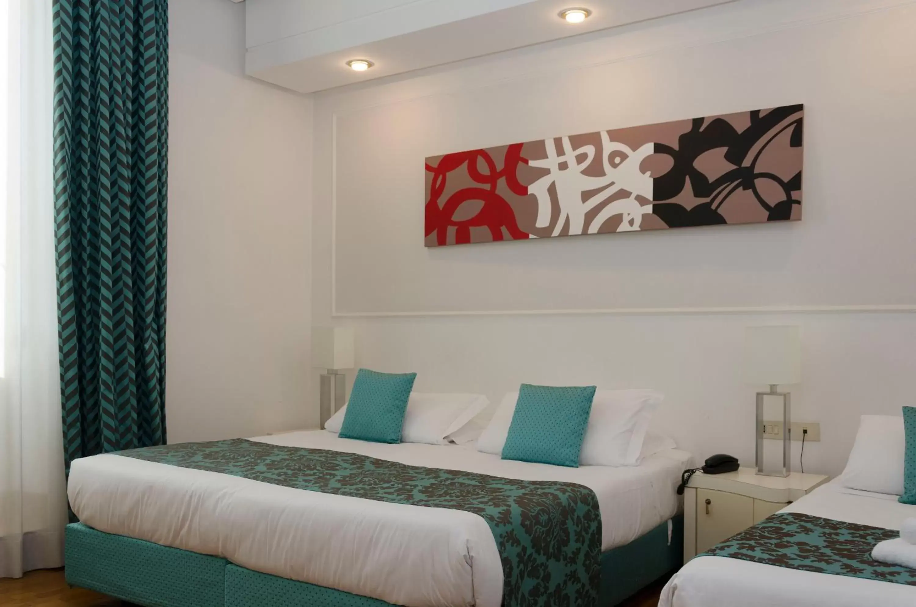 Bed in Hotel Traiano Bed in Hotel Traiano