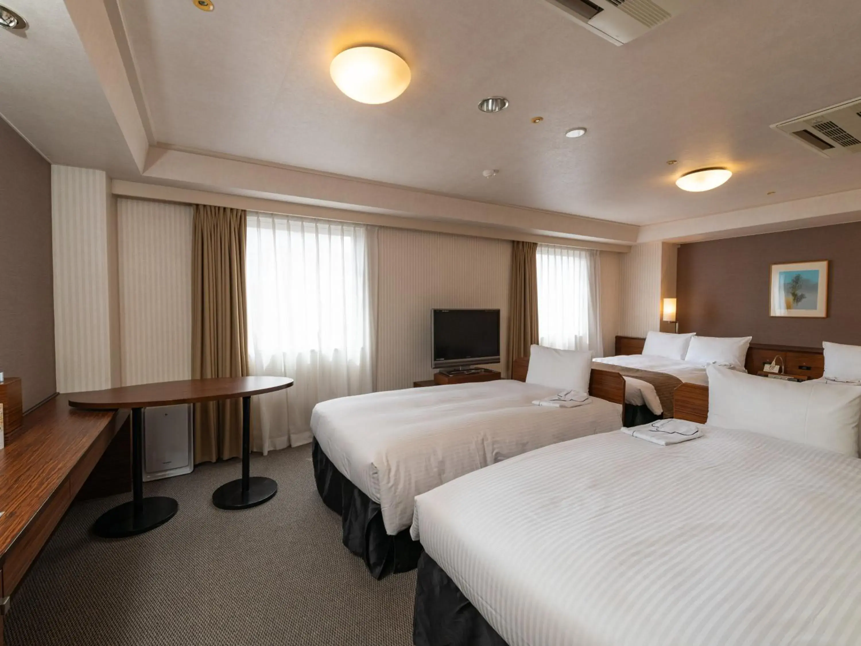 Bed in Alpico Plaza Hotel Bed in Alpico Plaza Hotel