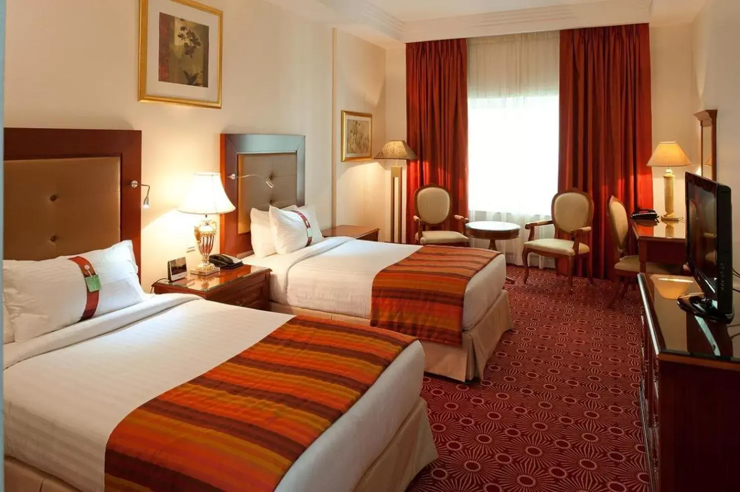 Photo of the whole room, Bed in Holiday International Hotel Embassy District