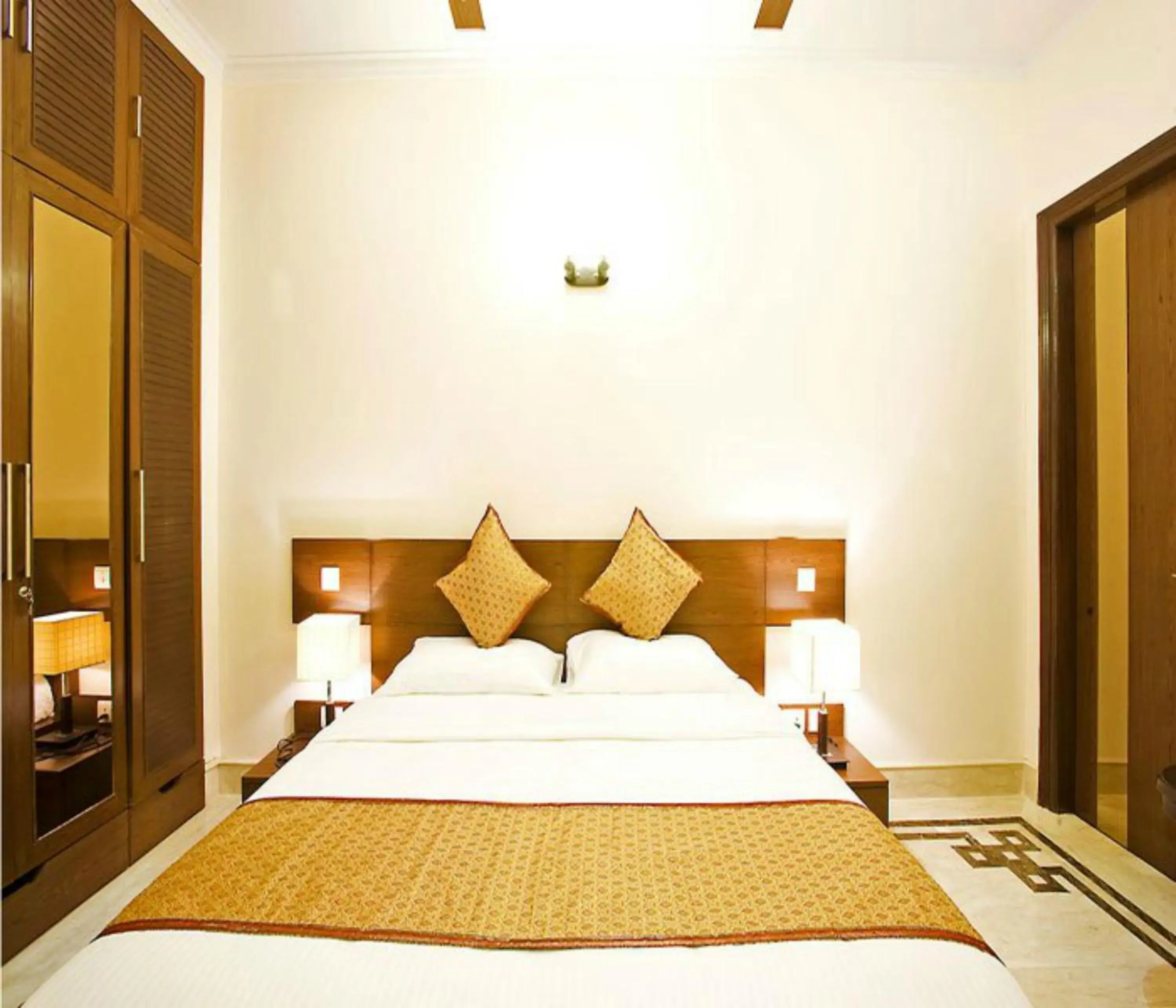 Bed in Evergreen Suites Defence Colony