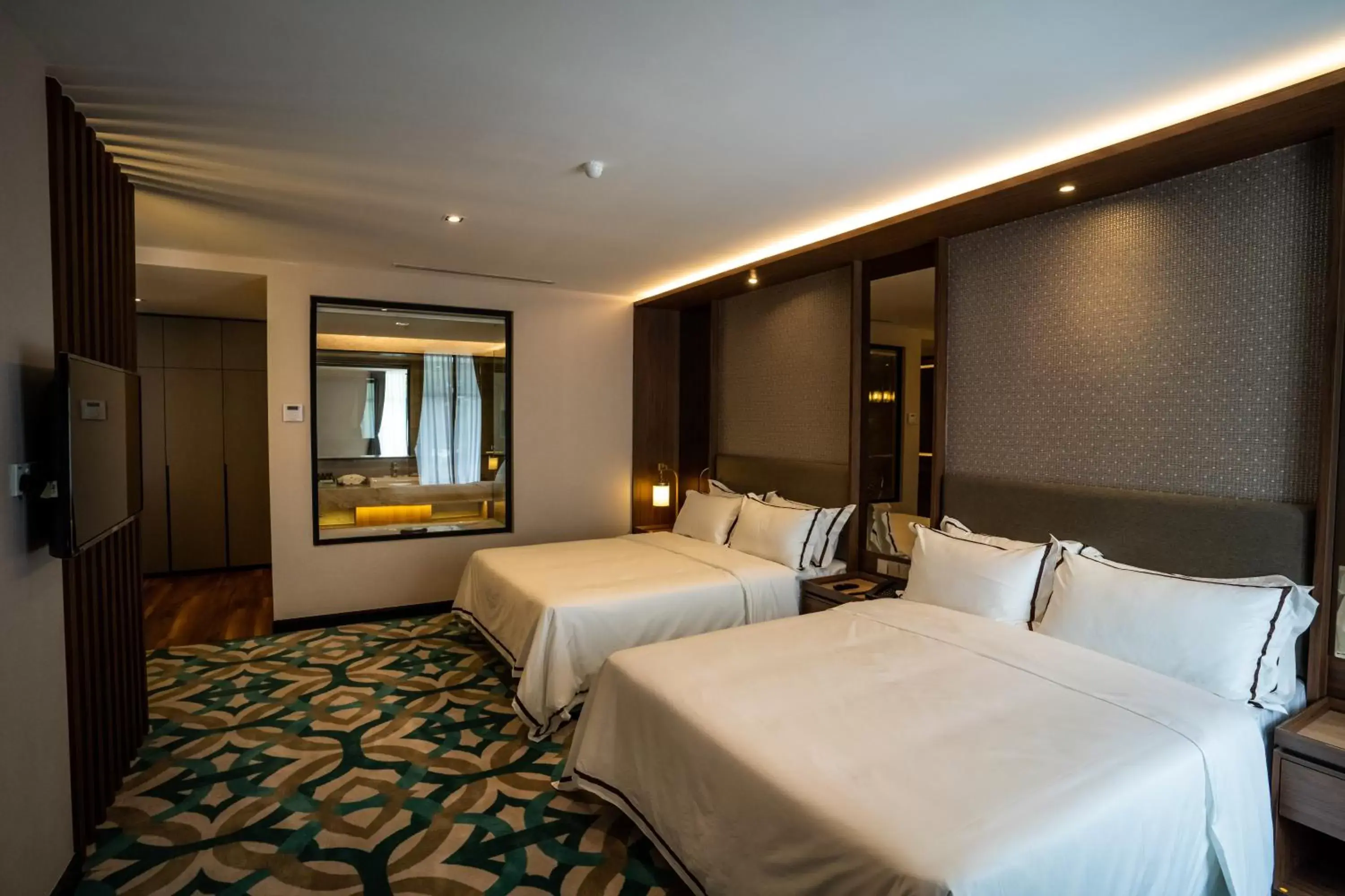 Bed in CHRISTEE SUITES HOTEL Bed in CHRISTEE SUITES HOTEL