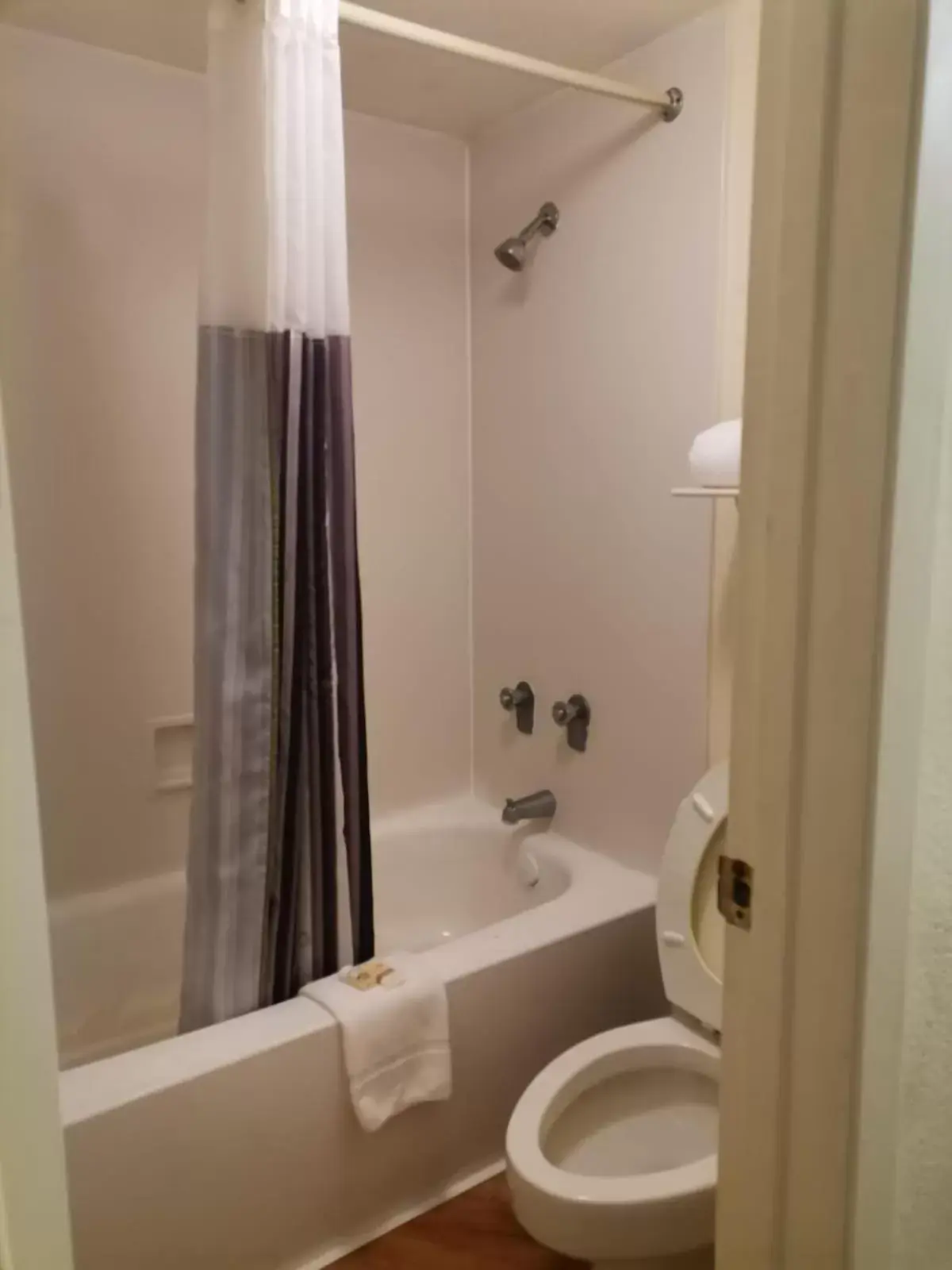 Bathroom in Super 8 by Wyndham San Antonio Near SeaWorld Ingram Park