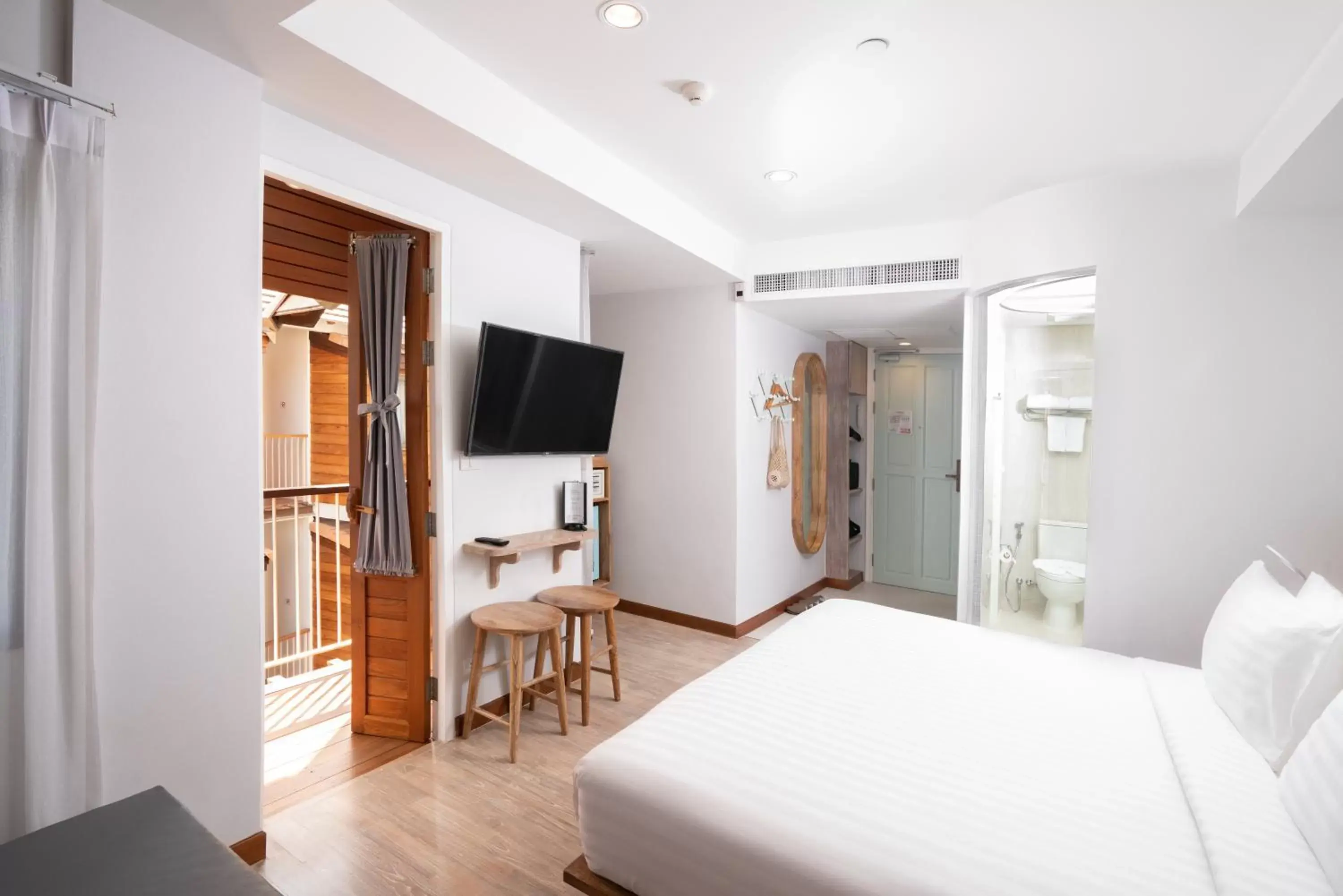 Bedroom, TV/Entertainment Center in Pastell Oldtown Chiang Mai SHA Extra Plus