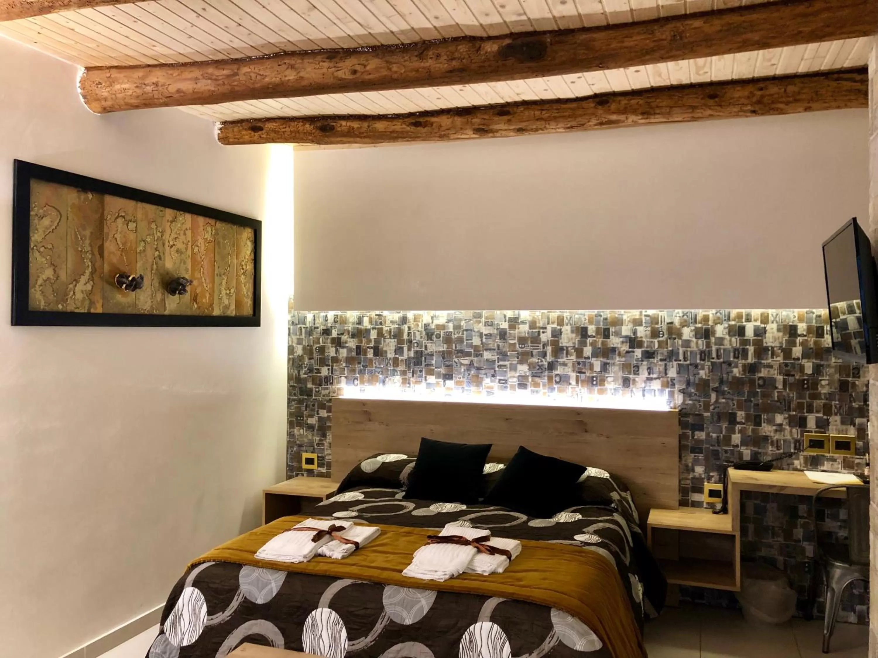 Bed in Relais Piazza Del Plebiscito B&B